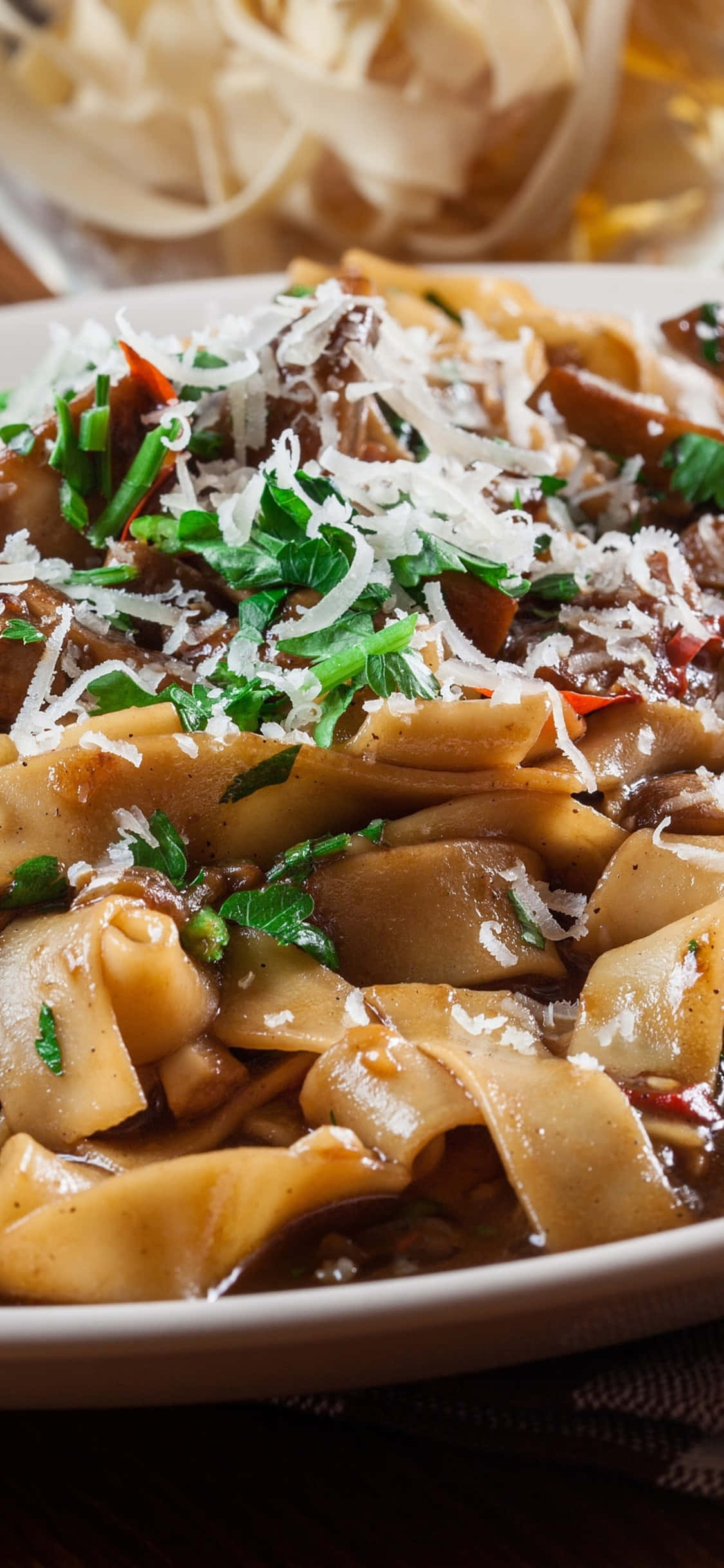 Aanloklike Pasta Genot As Jou iPhone X Agtergrond Muurpapier
