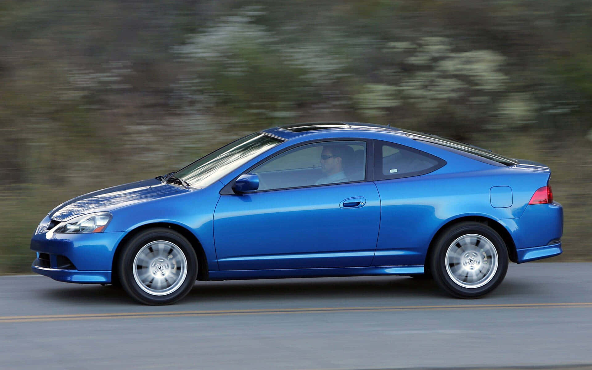 Acura RSX: Werkverrigting ontmoet luukse op die pad Muurpapier