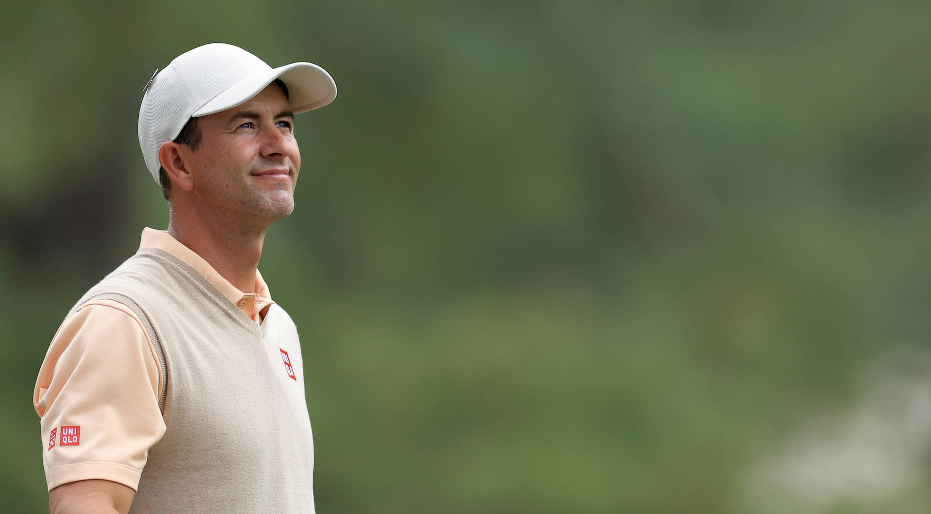 Adam Scott wat opkyk Muurpapier
