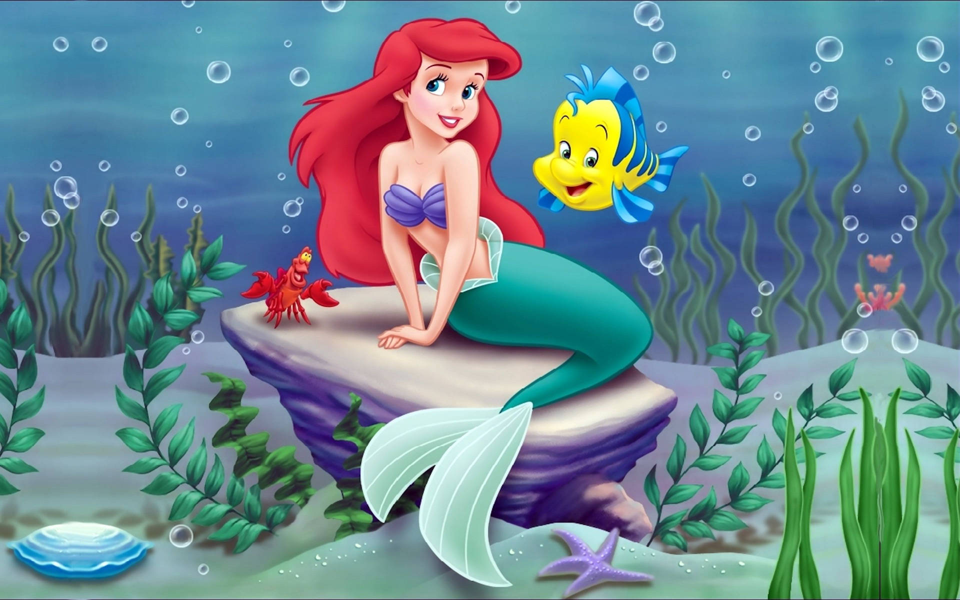 The Little Mermaid Ariel en Flounder onderwater muurpapier.