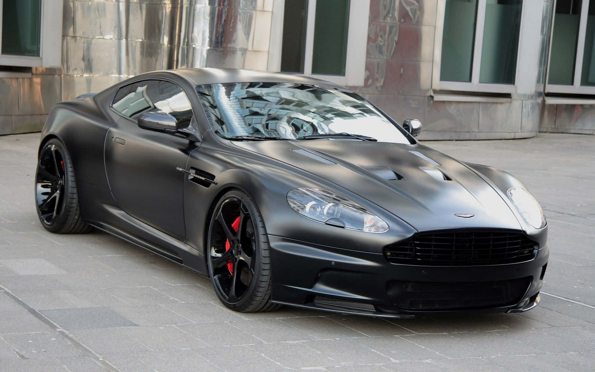 Aston Martin DB9 - Luukse op sy Hoogtepunt Muurpapier