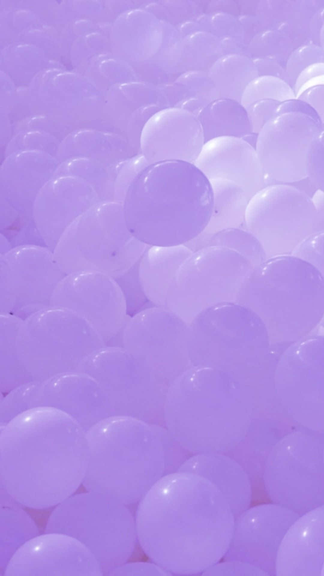 Ballonne in Laventel Pastelpers Estetiese Agtergrond Muurpapier