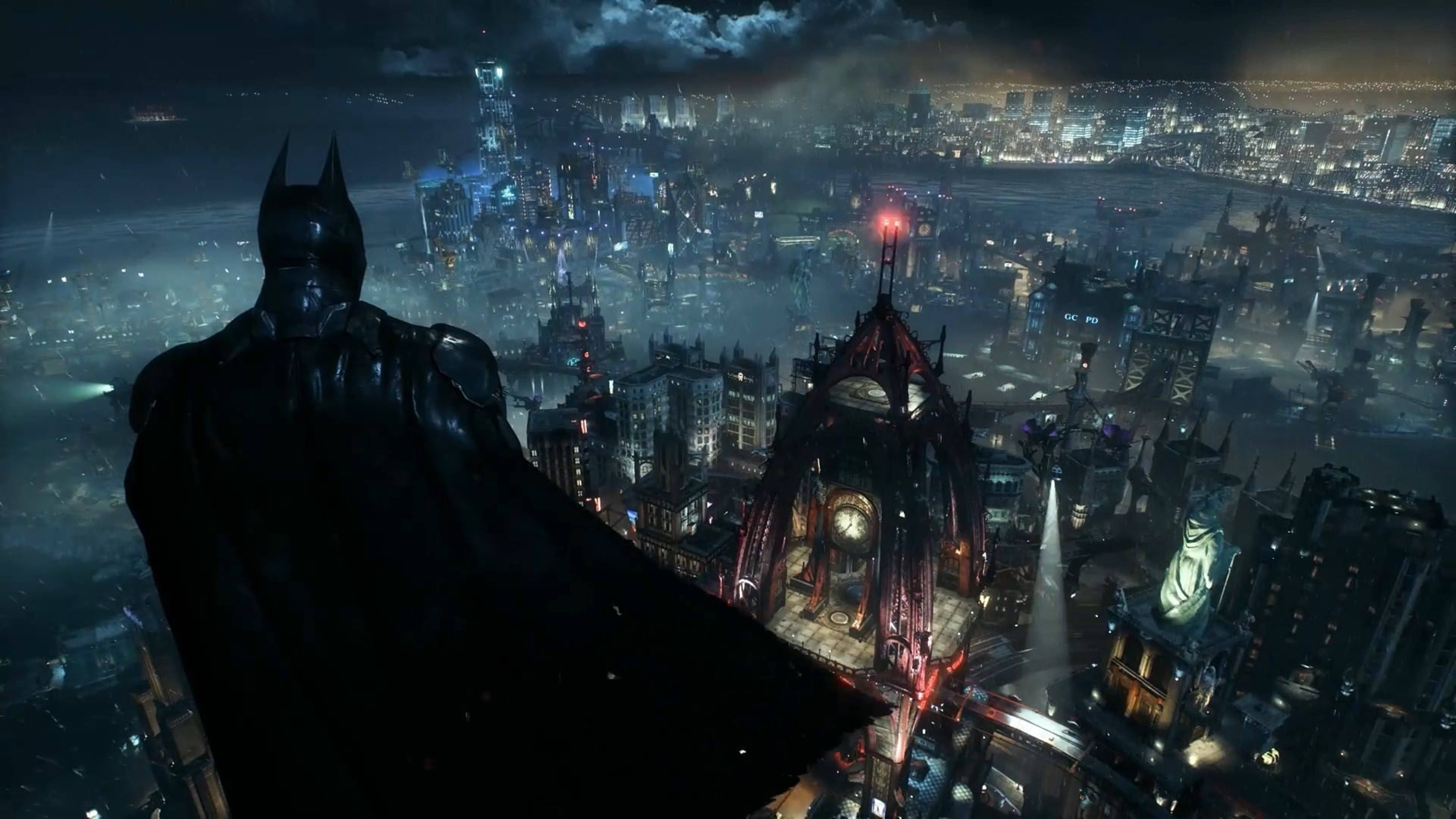 Batman wat oor Arkham City uitkyk 4K Muurpapier