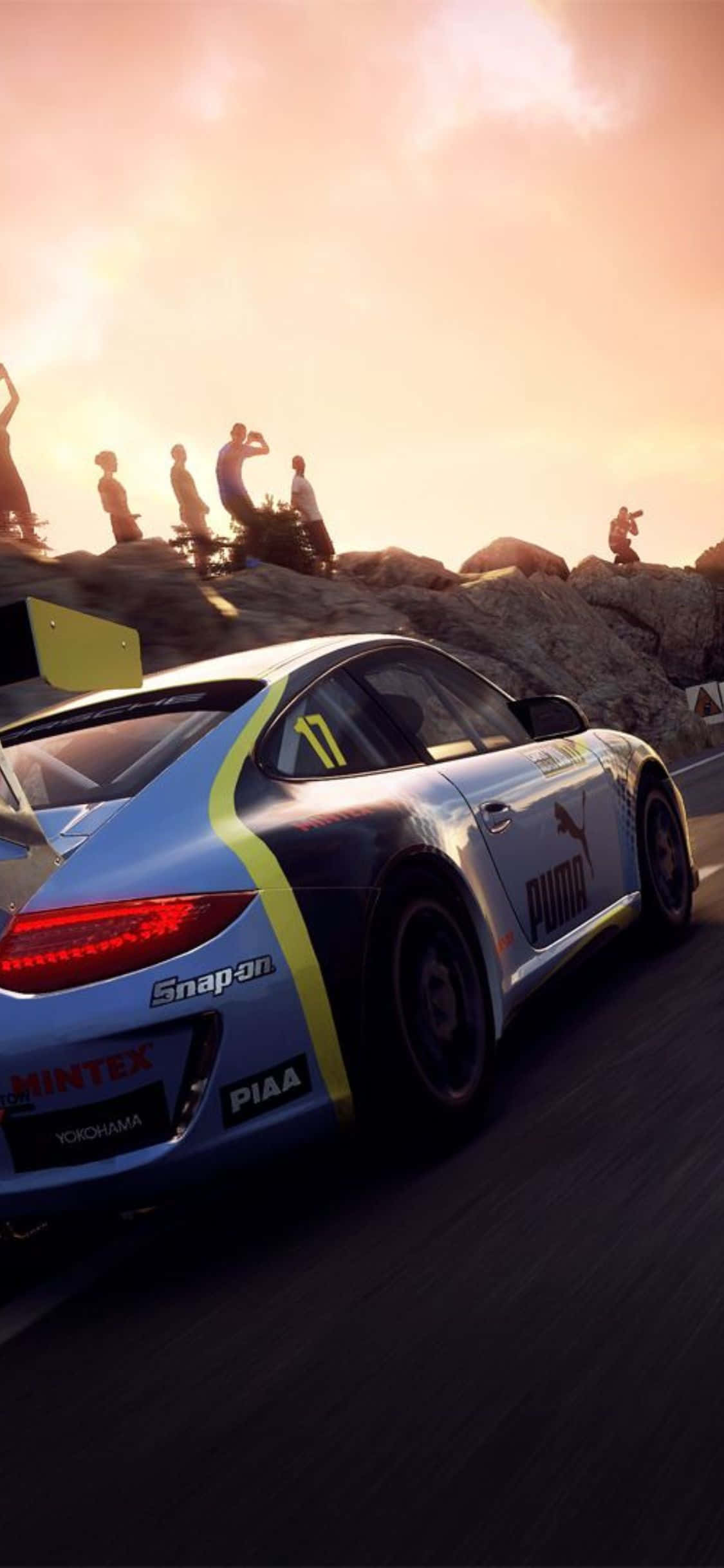 Beeld Bestuurders wat kronkelende paadjies in 'n Dirt Rally-kompetisie aandurf Muurpapier