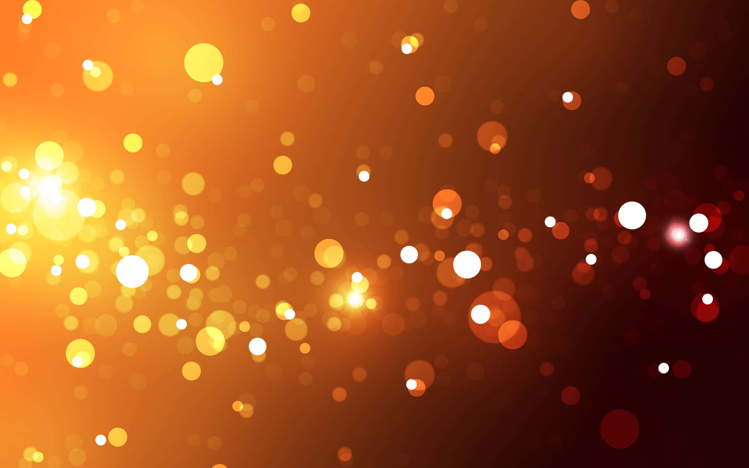 Bokeh-effekte in swart en oranje agtergrond Muurpapier