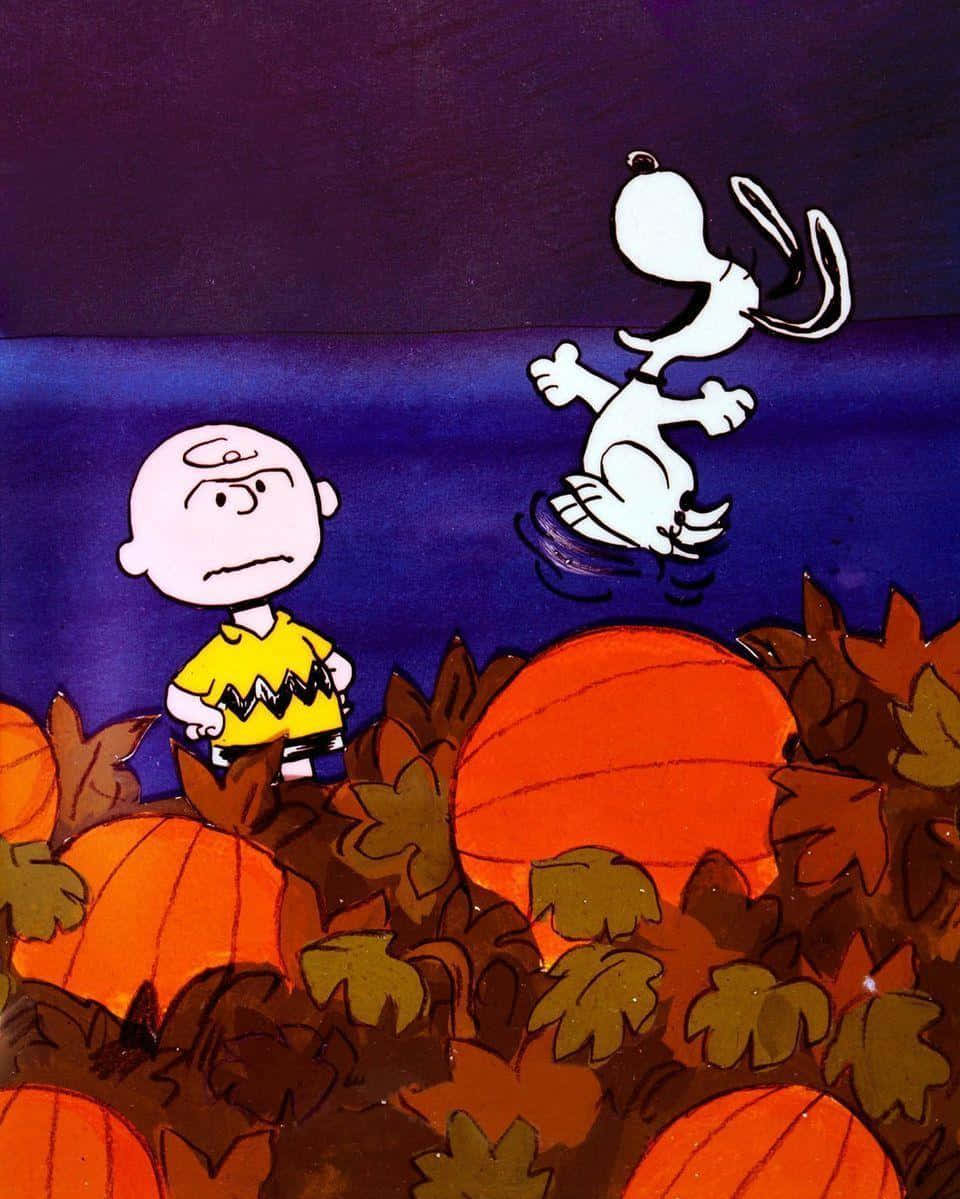 Charlie Brown en Peanuts in die pampoenland Muurpapier