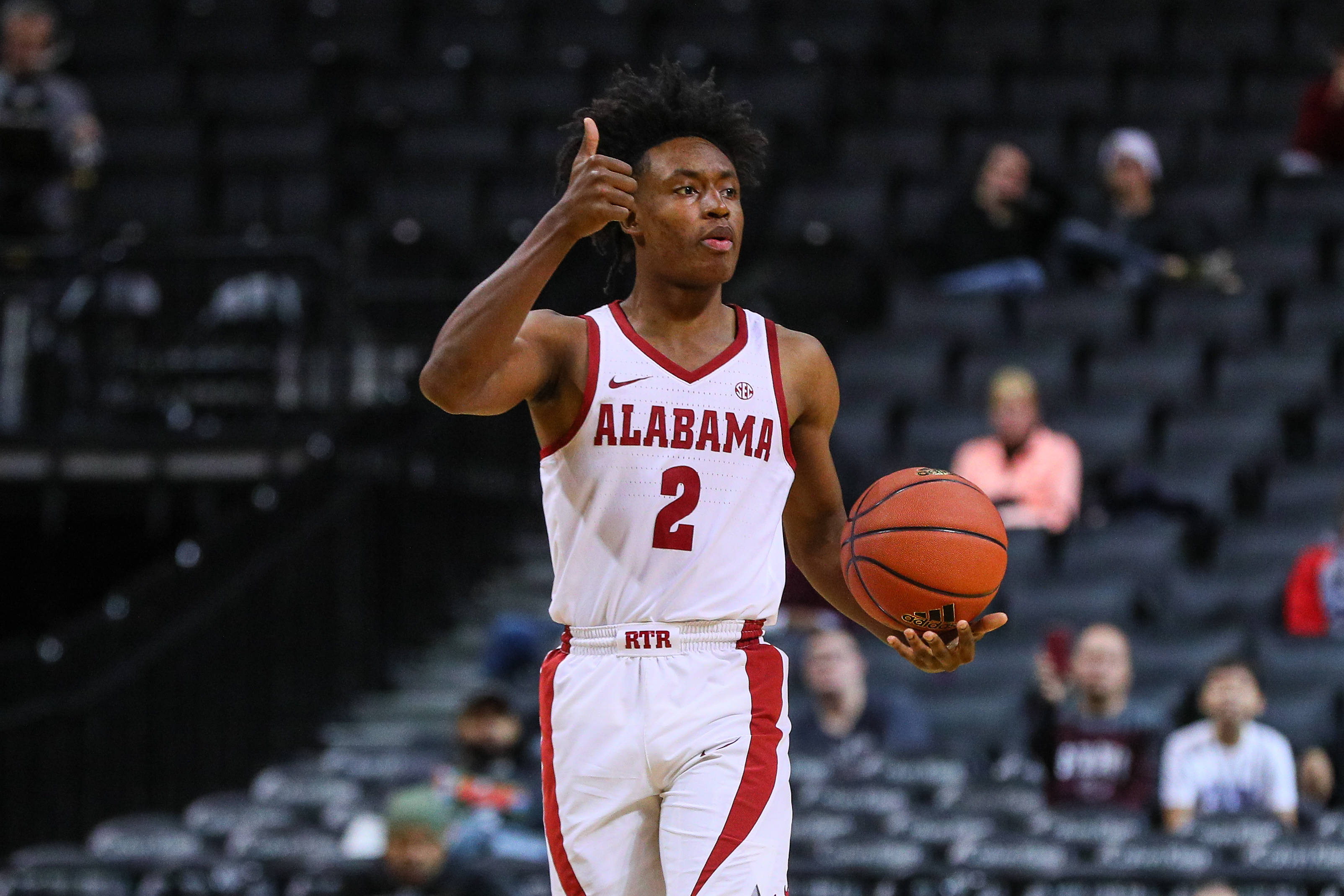 Collin Sexton Duim Op in Basketbal Liga Muurpapier