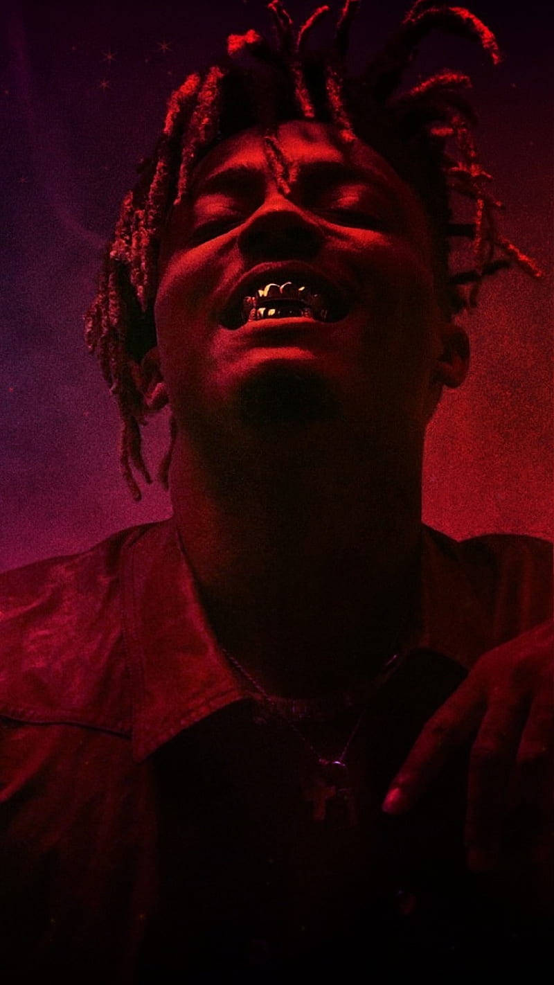 Cool Juice WRLD wys sy tande Muurpapier