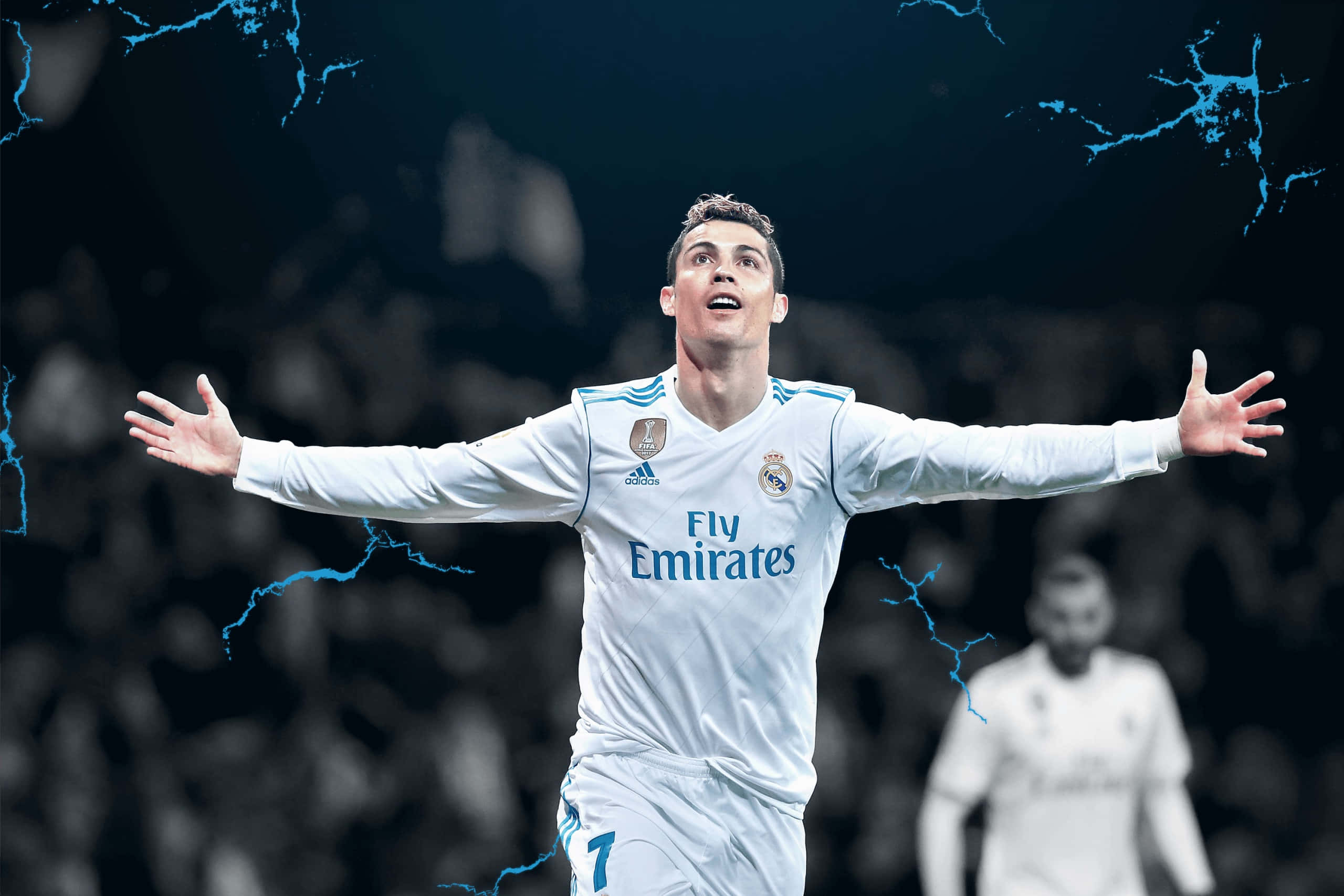 Cristiano Ronaldo in aksie op die sokkerveld Muurpapier