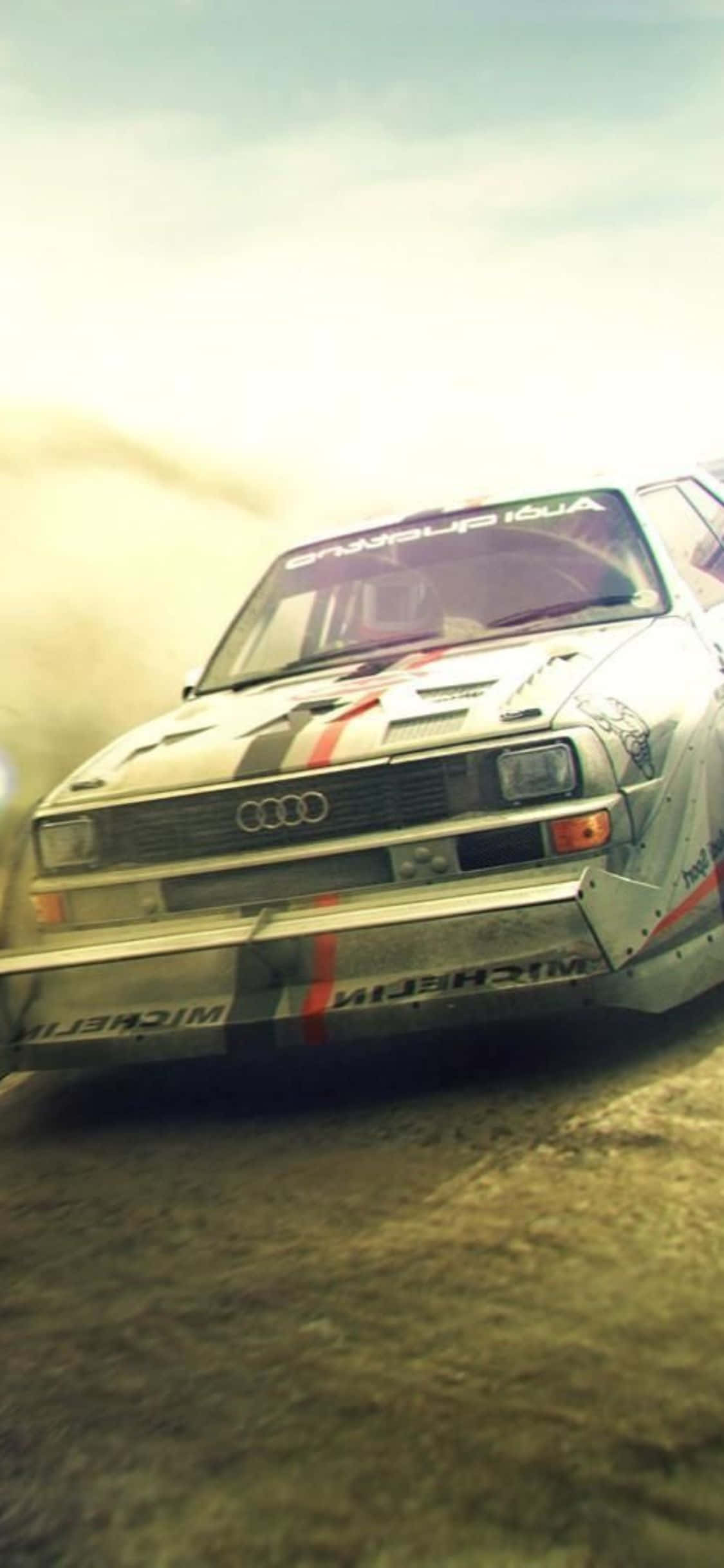 Dapper Bestuurders Neem die Opwinding van Dirt Rally in iPhone Xs aan Muurpapier