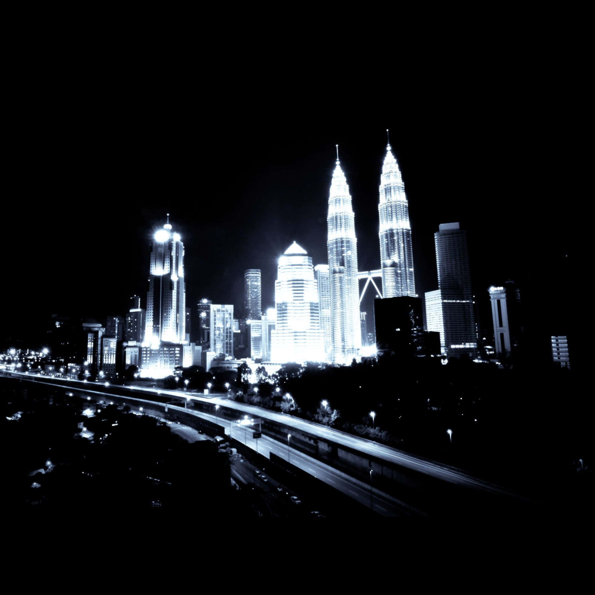 Die futuristiese stadsbeeld van Dark City Muurpapier