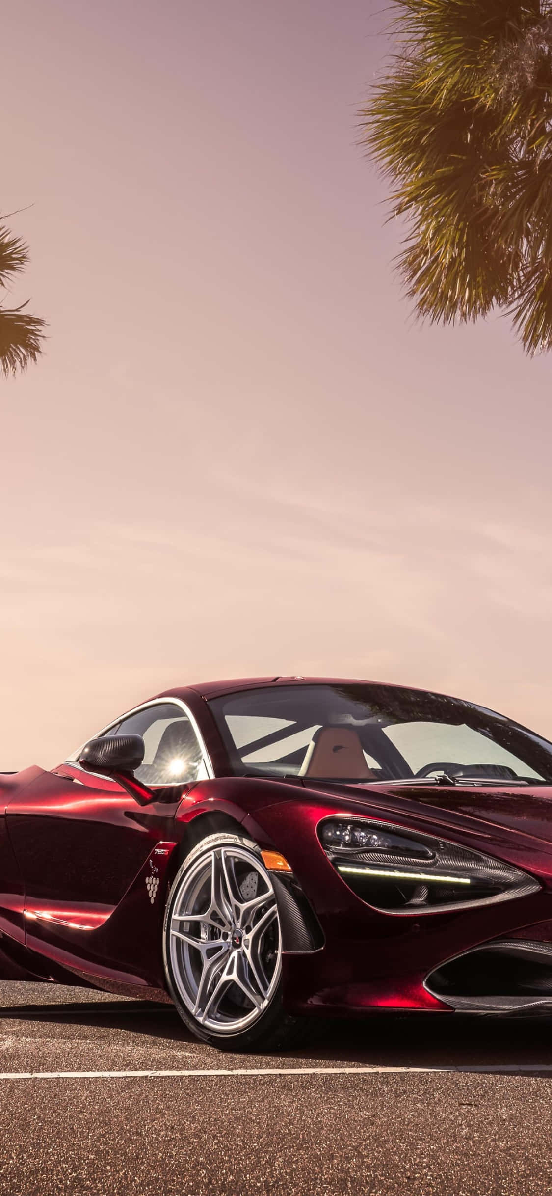 Die iPhone Xs en Mclaren 720s: 'n Simbool van Luuksheid Muurpapier