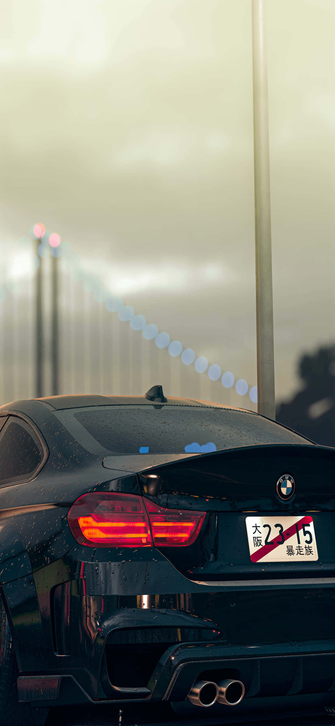 Die slanke BMW Coupe gepaard met die klassieke Apple iPhone X. Muurpapier