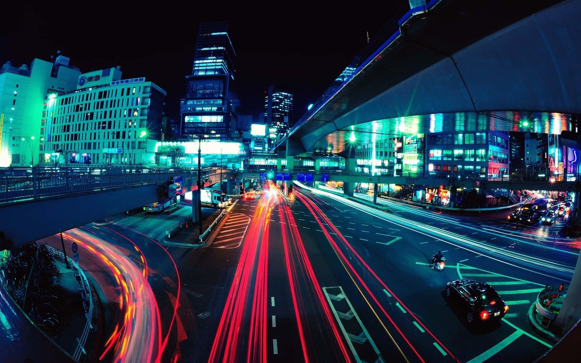 Die Stad Wat Nooit Slaap Nie: Neonligte Skyn Helder in Neon City Muurpapier