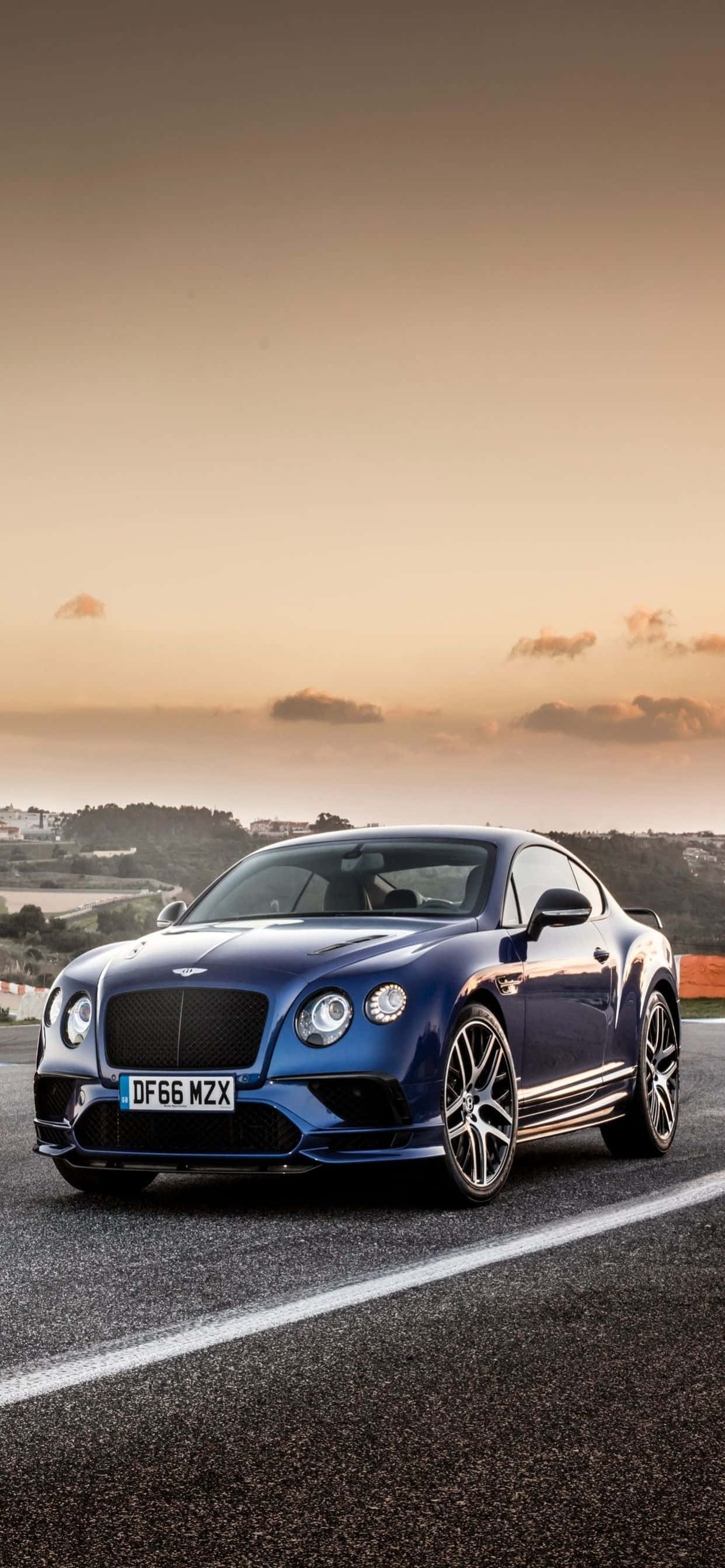 Die toonbeeld van luukse as jou agtergrondprent - iPhone XS Max met 'n Bentley Muurpapier
