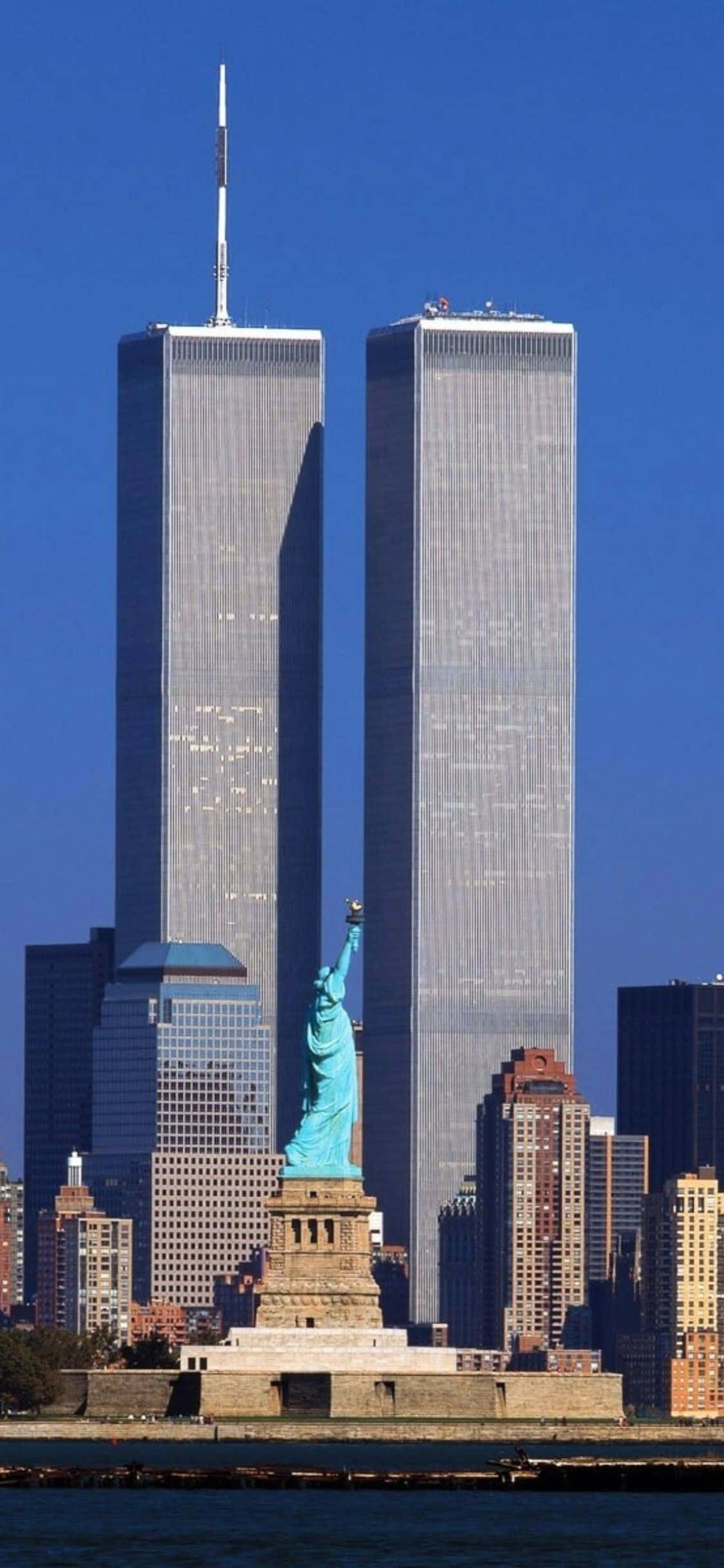 Die verligte hemel van New York Stad nooi jou uit om die stad met jou iPhone X te verken. Muurpapier
