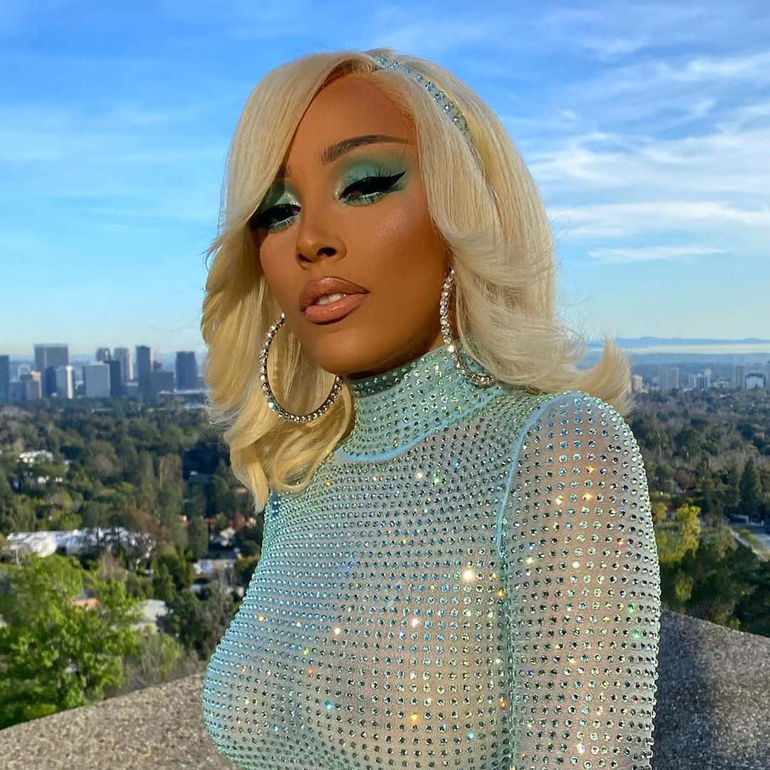 Doja Cat tree op vir 'n betowerde skare op Muurpapier