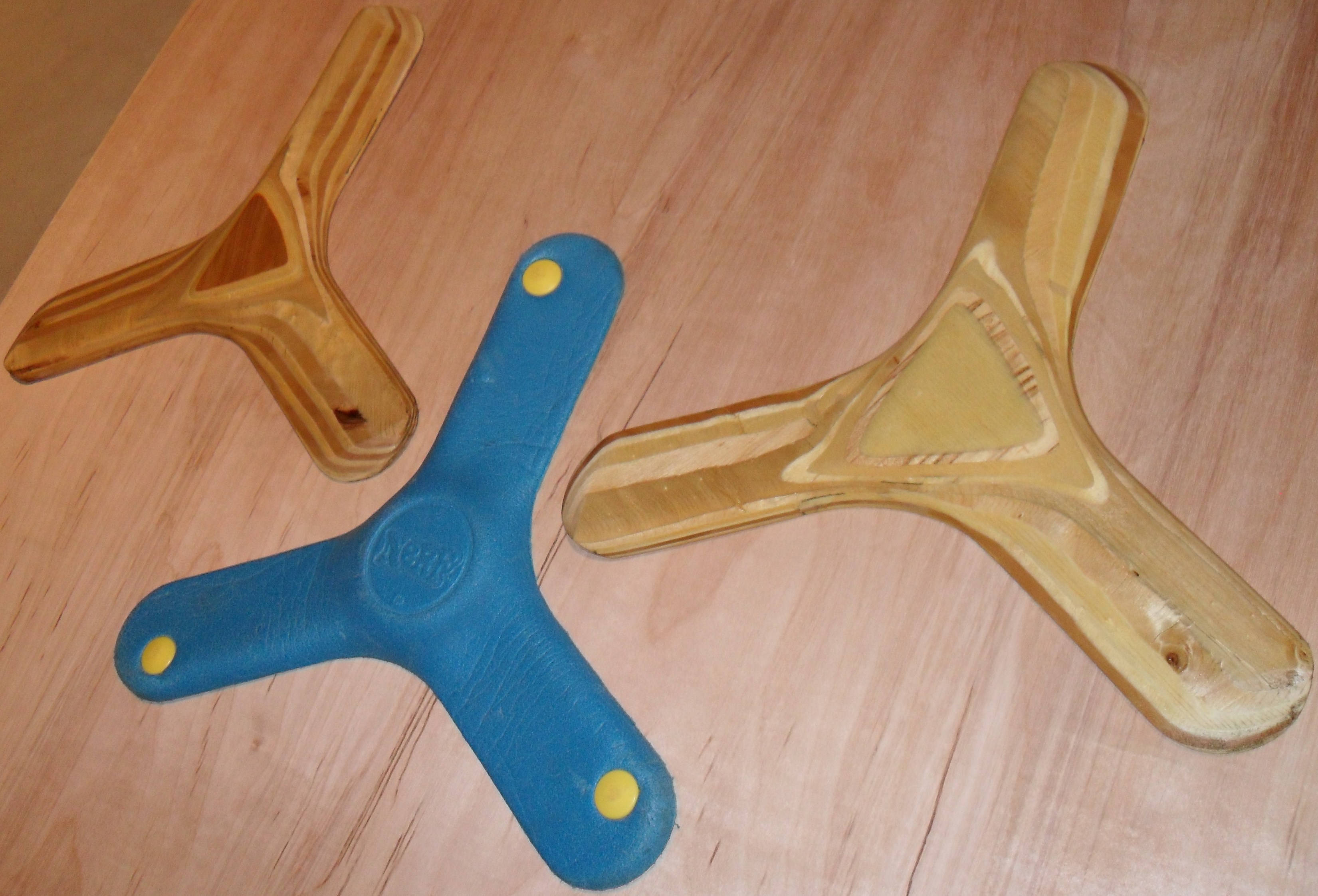 Driesydige Boemerangs Muurpapier