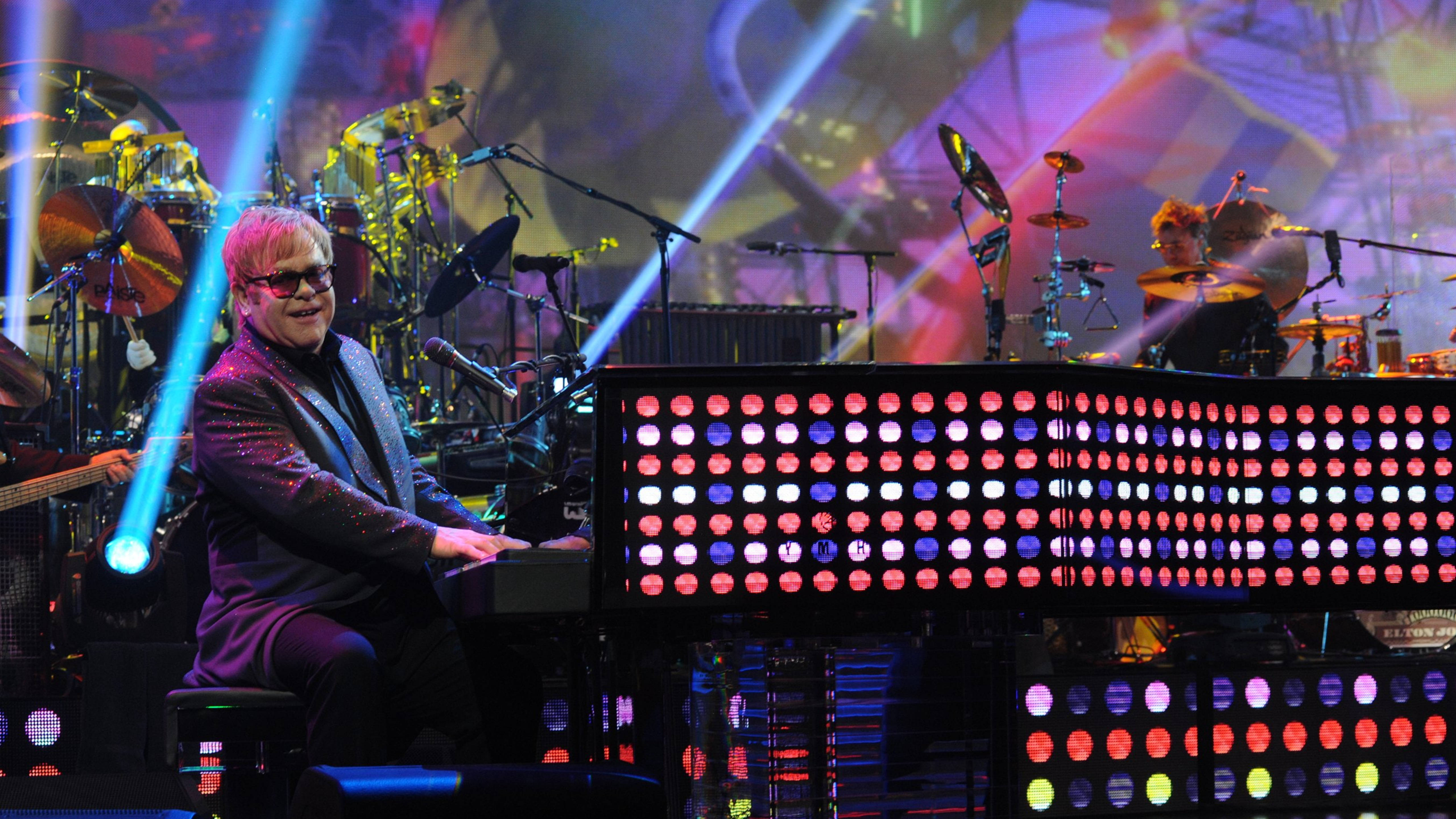 Elton John Kolpunte Klavier Muurpapier