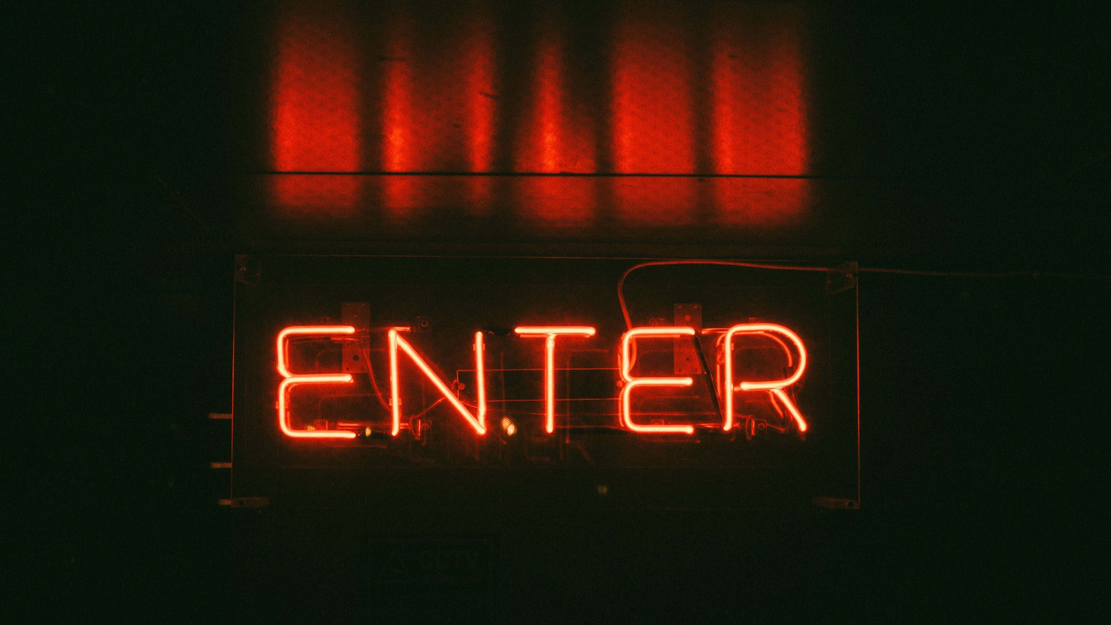 'Enter' in Neonrooi-estetiek Muurpapier