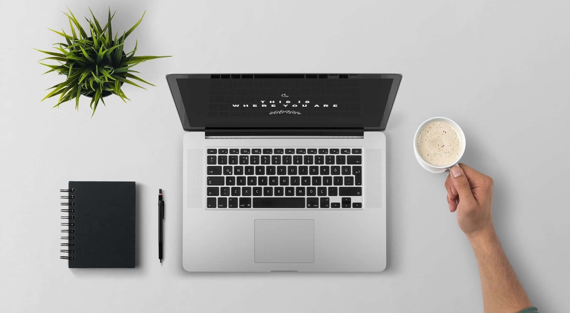 Ervaar die Estetiek van 'n Macbook Muurpapier