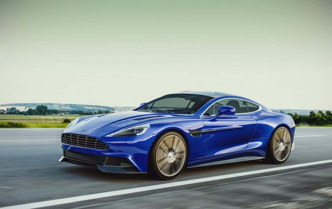 Ervaar die krag en elegansie van die Aston Martin Vanquish Muurpapier