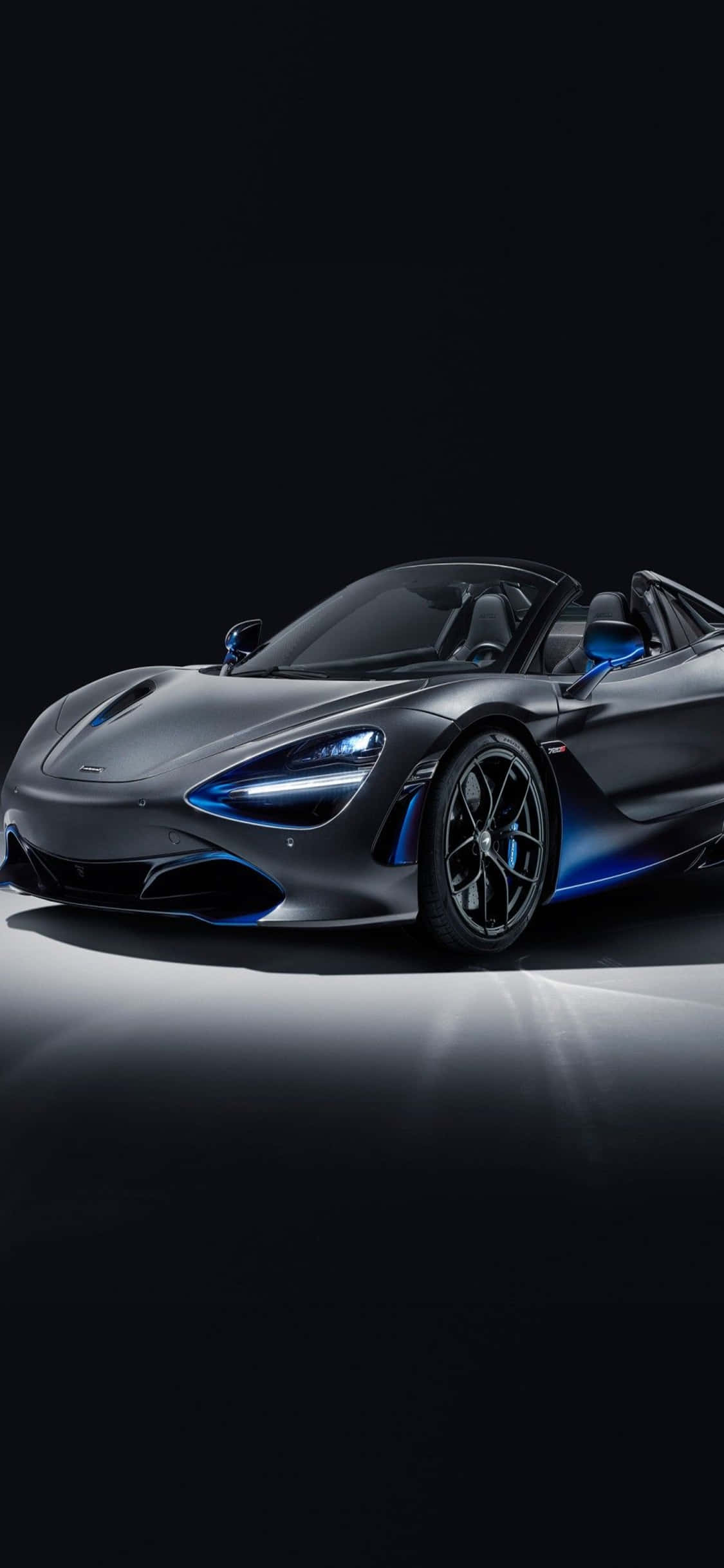 Ervaar die ongeëwenaarde krag van die iPhone Xs en die McLaren 720S Muurpapier