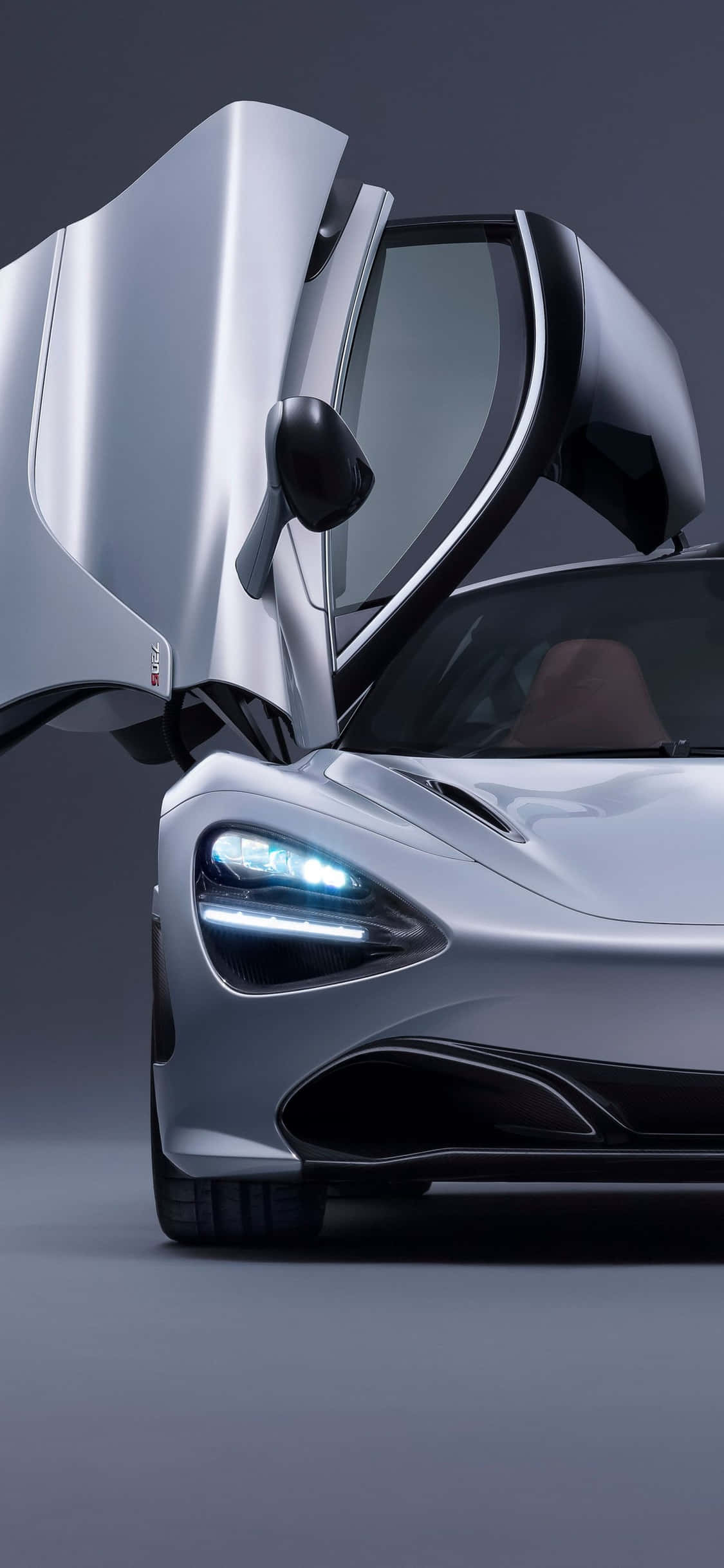 Ervaar iPhone Xs krag en spoed met die McLaren 720s Muurpapier