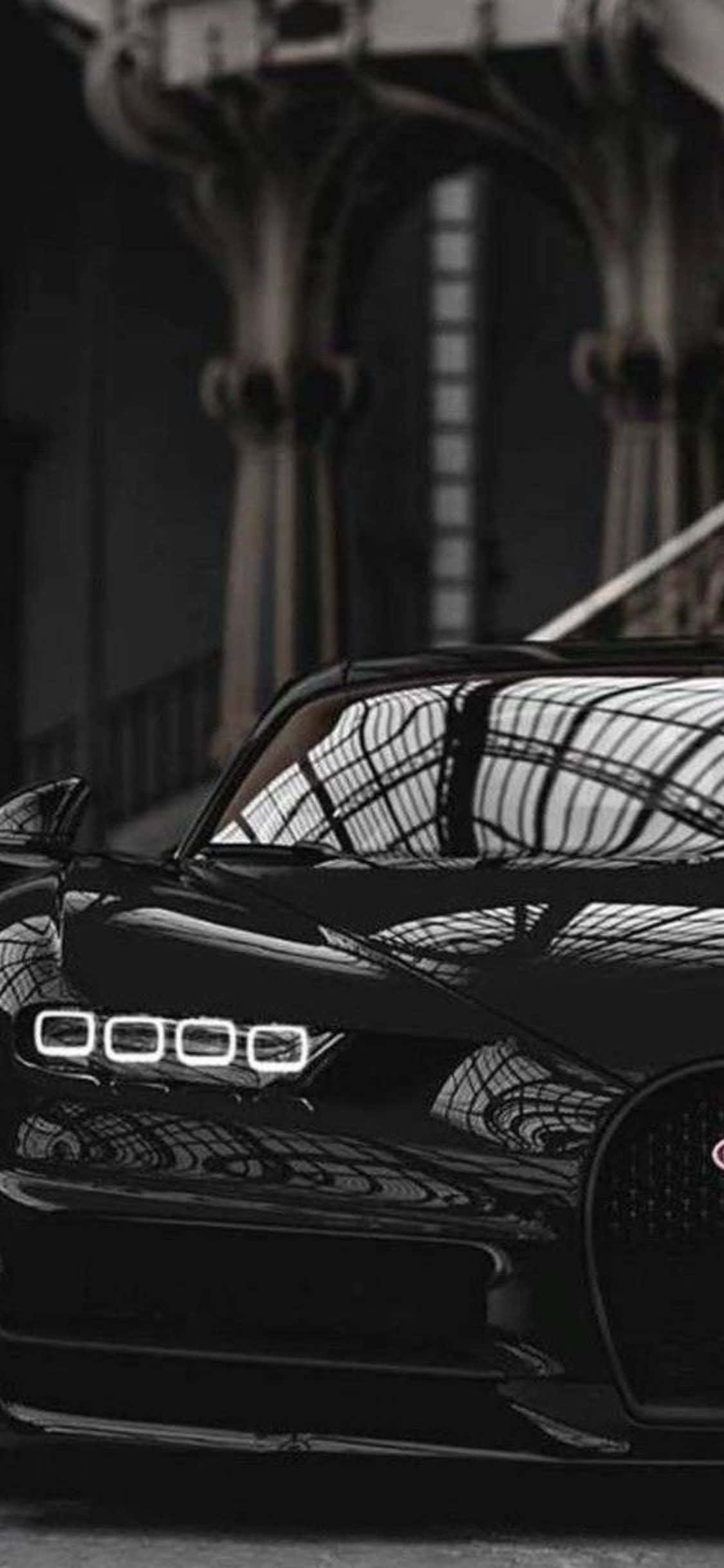 Ervaar spoed met die splinternuwe iPhone Xs en die Bugatti Chiron Muurpapier