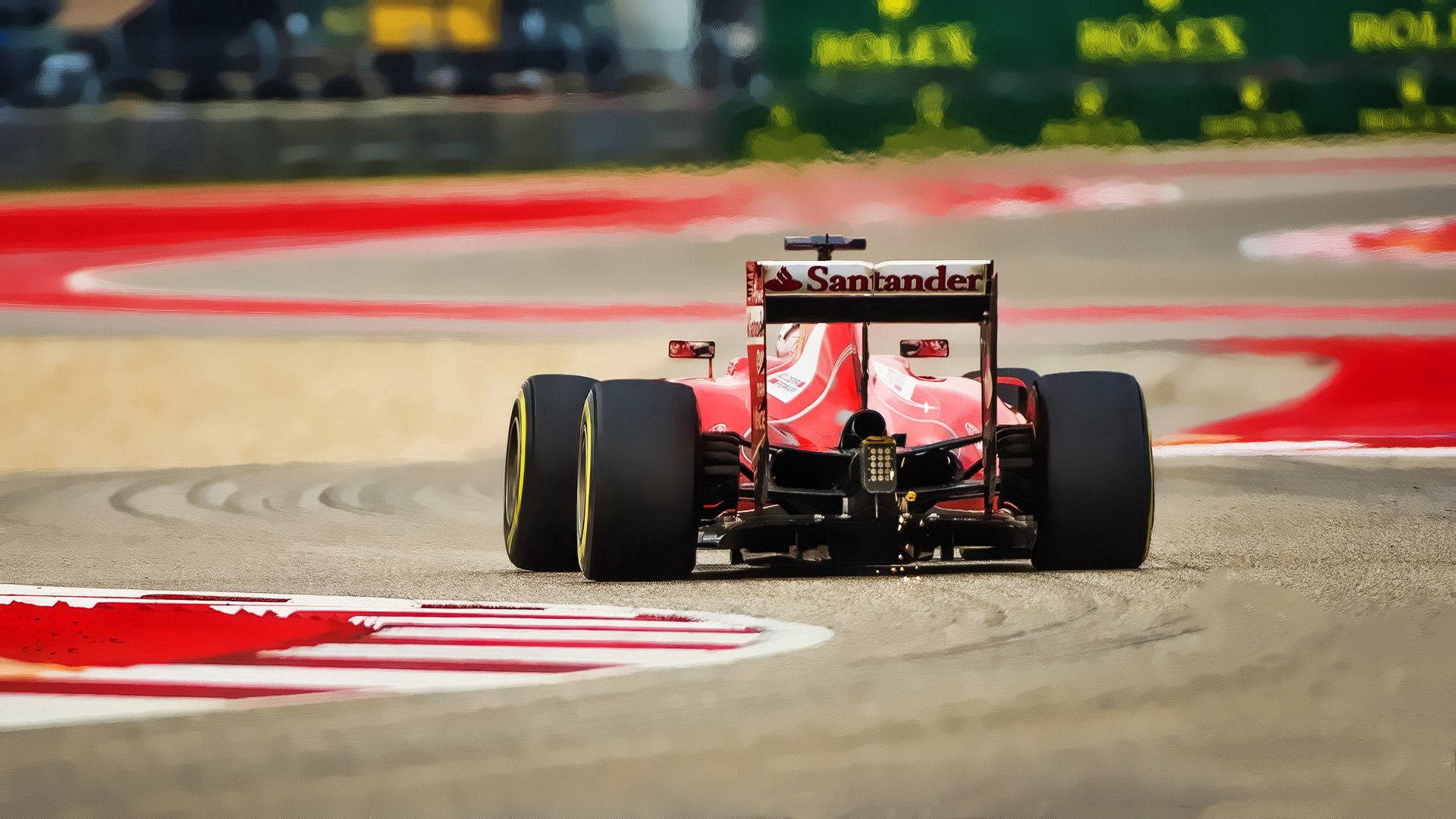Ferrari Formule 1 renmotor op 'n renbaan agtergrond.