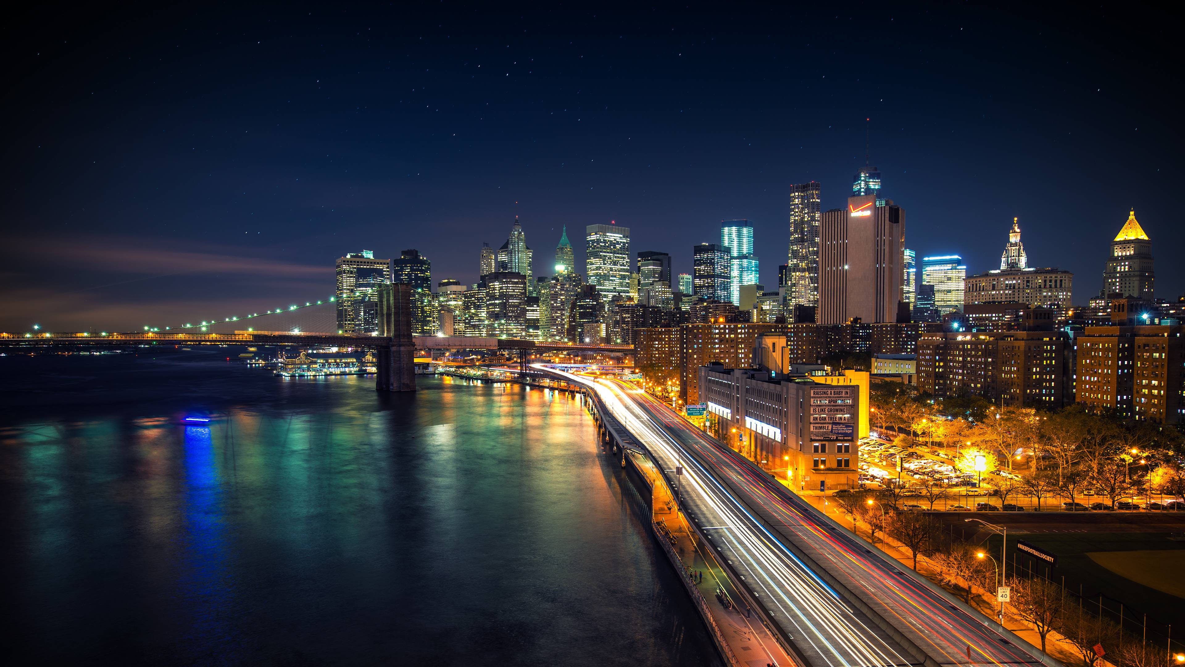 Geniet die Helder Ligte van New York Stad Muurpapier