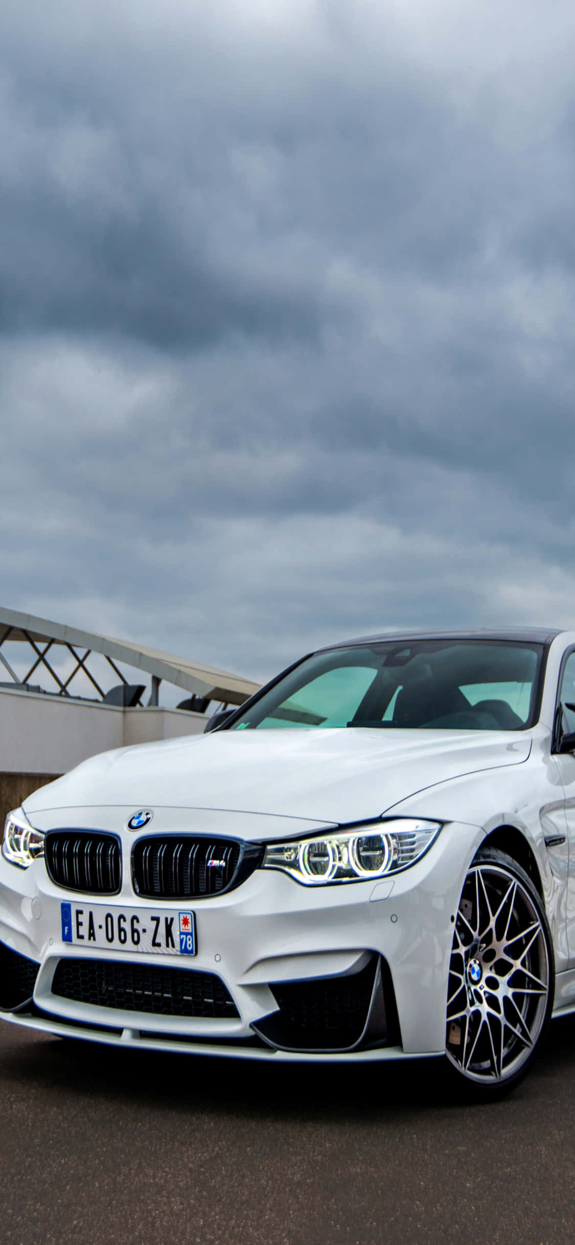 Geniet die krag van die nuwe iPhone X en BMW. Muurpapier