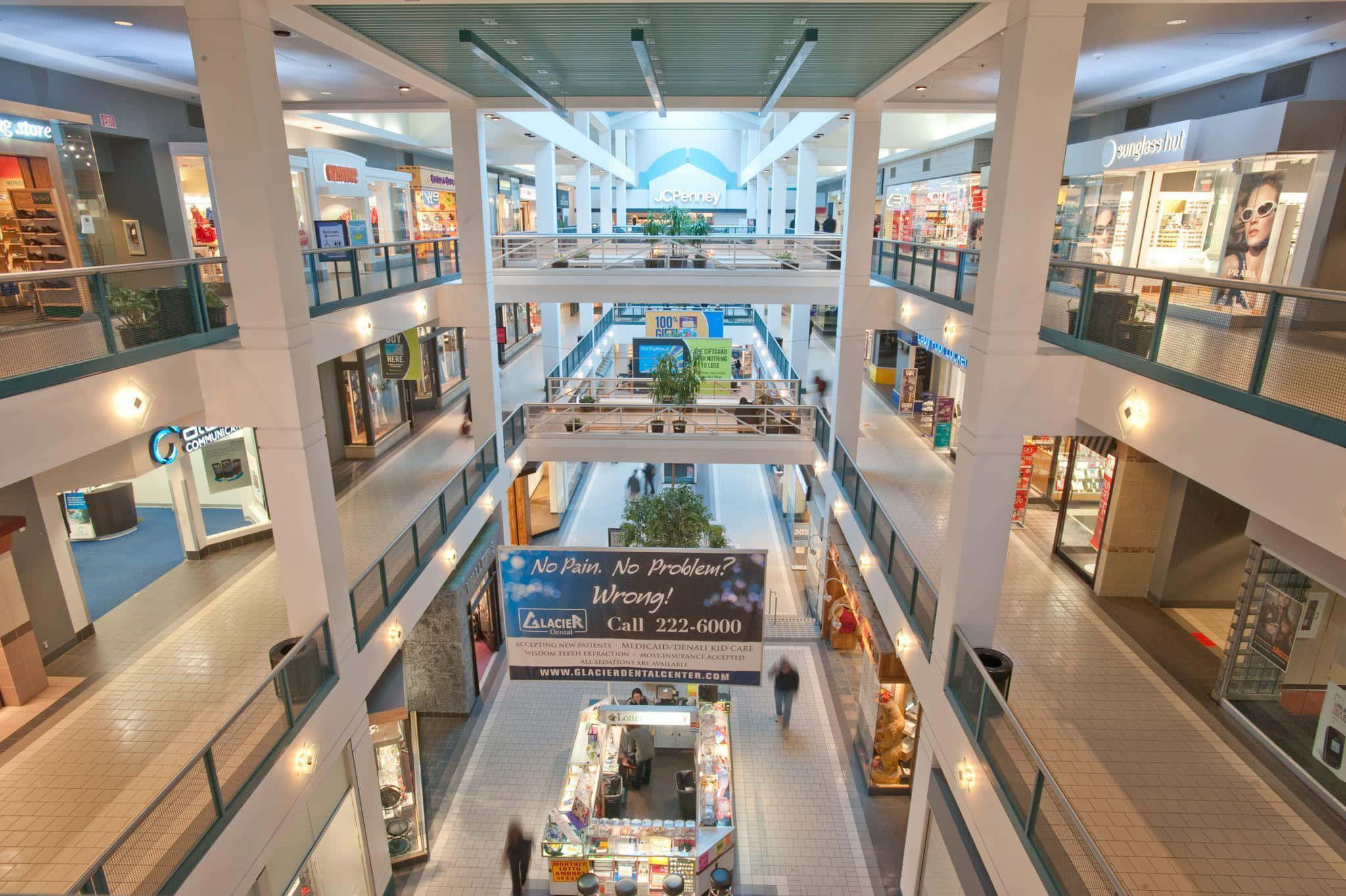 Geniet die lewendige atmosfeer van die moderne winkelsentrum. Muurpapier