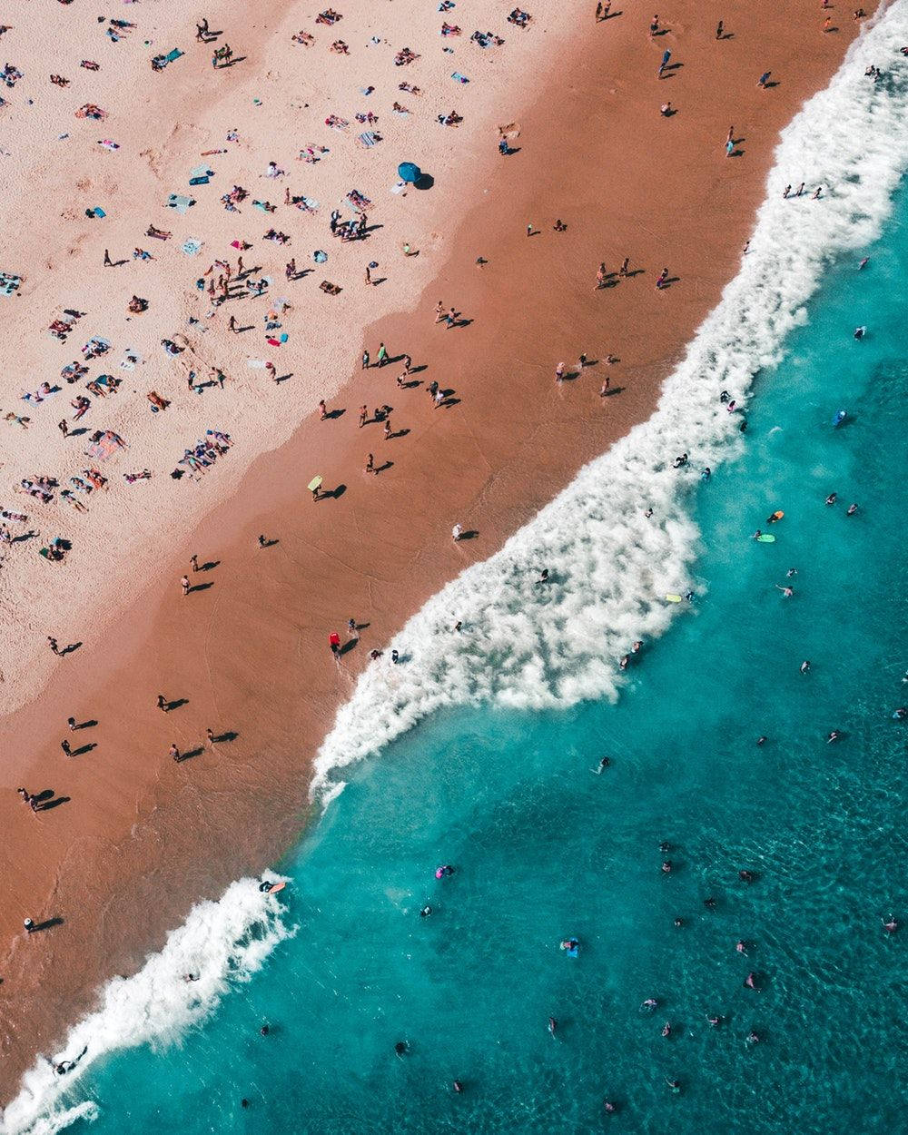 Hommeltuigskoot oor strand Iphone agtergrond