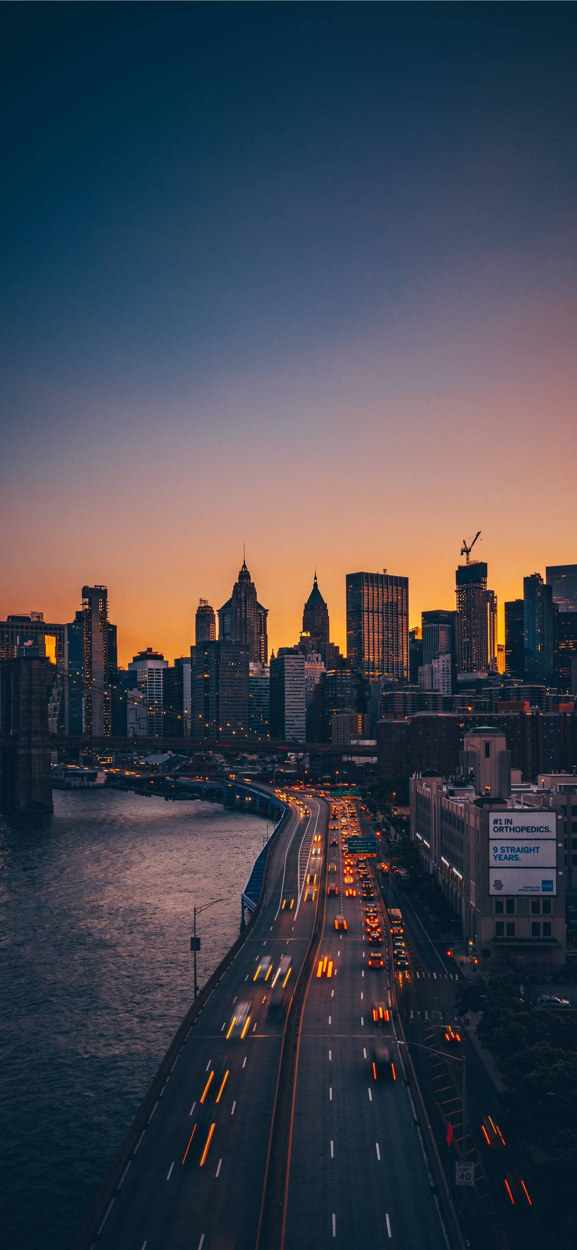 Geniet 'n Asemrowende Uitsig oor New York se Horison vanaf jou iPhone Muurpapier