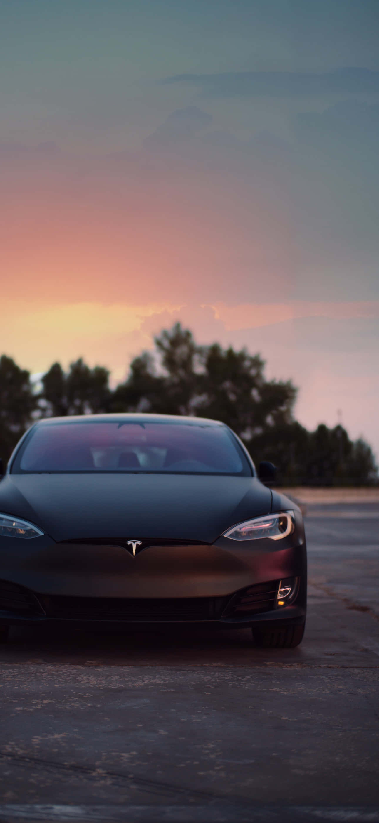 Geniet 'n draadlose wêreld met die Tesla iPhone. Muurpapier