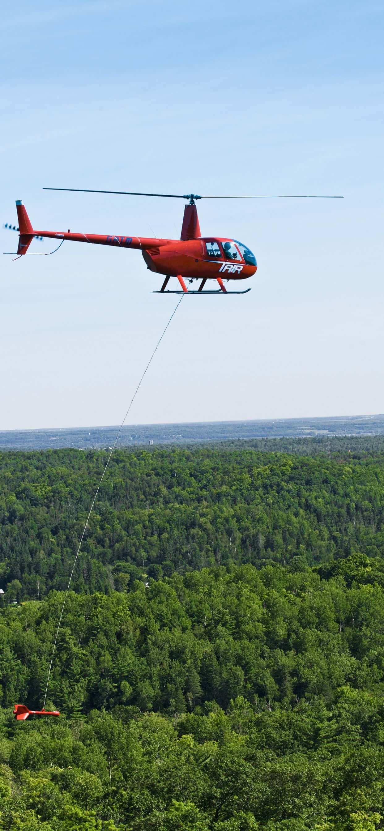 Geniet 'n epiese uitsig van Helikopters met die krag van die iPhone Xs Max Muurpapier