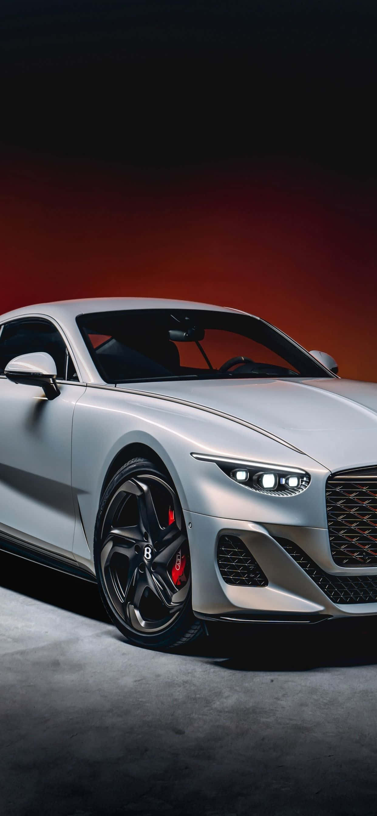 Geniet die luukse van elegansie en tegnologie met hierdie iPhone Xs MAX in 'n stylvolle Bentley. Muurpapier