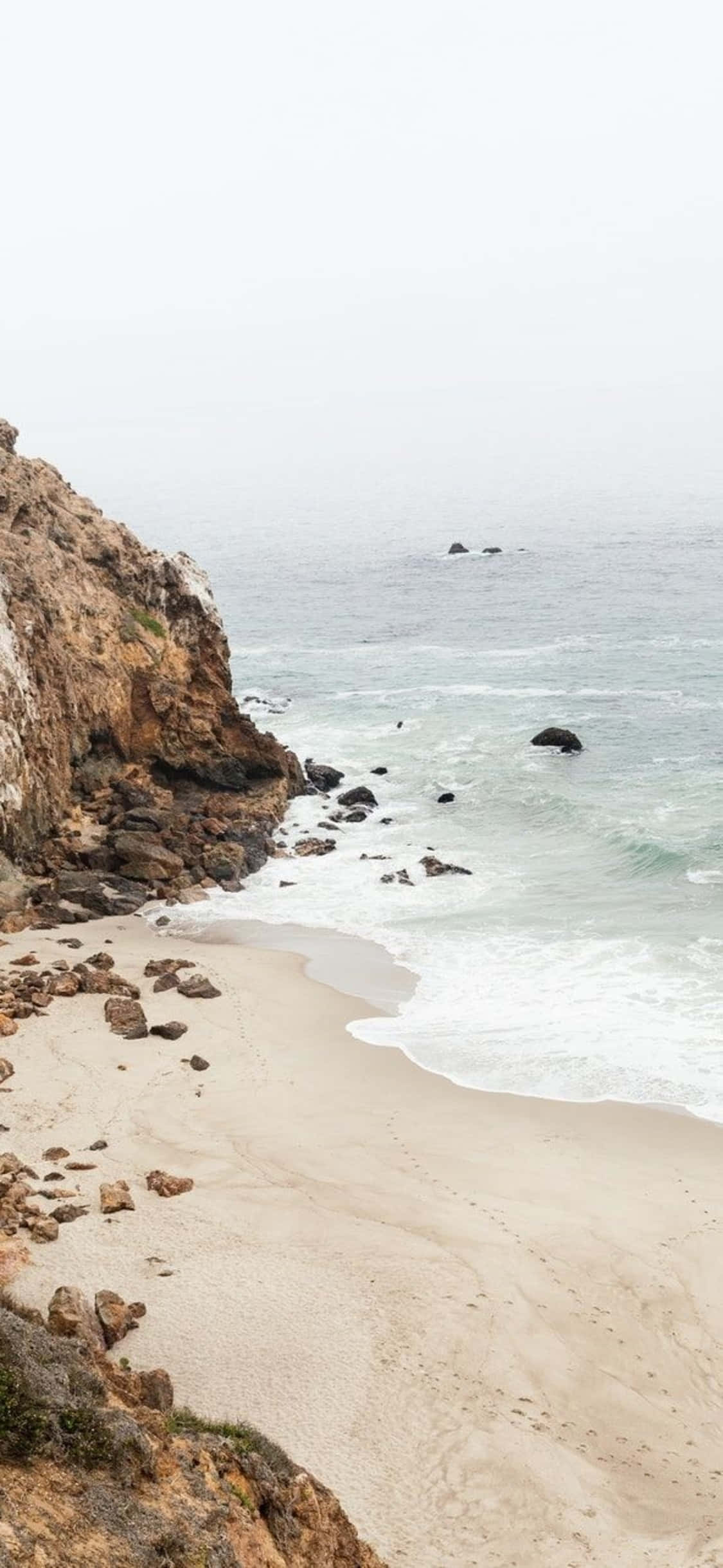 Geniet van die uitsigte vanaf Malibu met die nuutste iPhone Xs Muurpapier