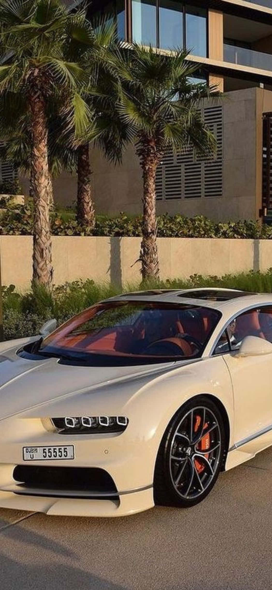 Optimale Luukse: 'n iPhone XS en 'n Bugatti Veyron, die perfekte kombinasie vir die luukse leefstyl Muurpapier