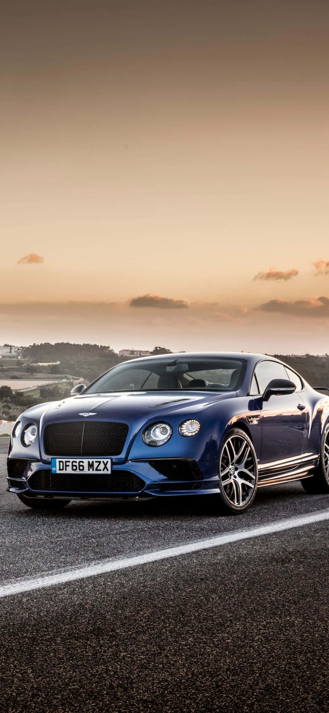 Geparkeerde Blou Bentley iPhone Muurpapier
