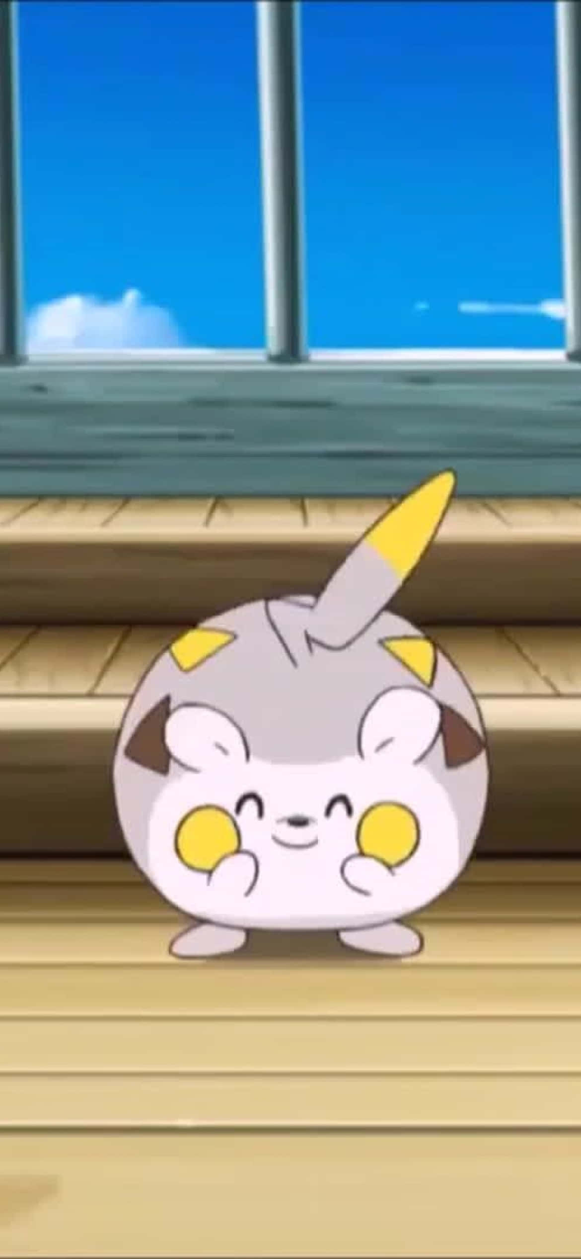 Glimlaggende Togedemaru Muurpapier