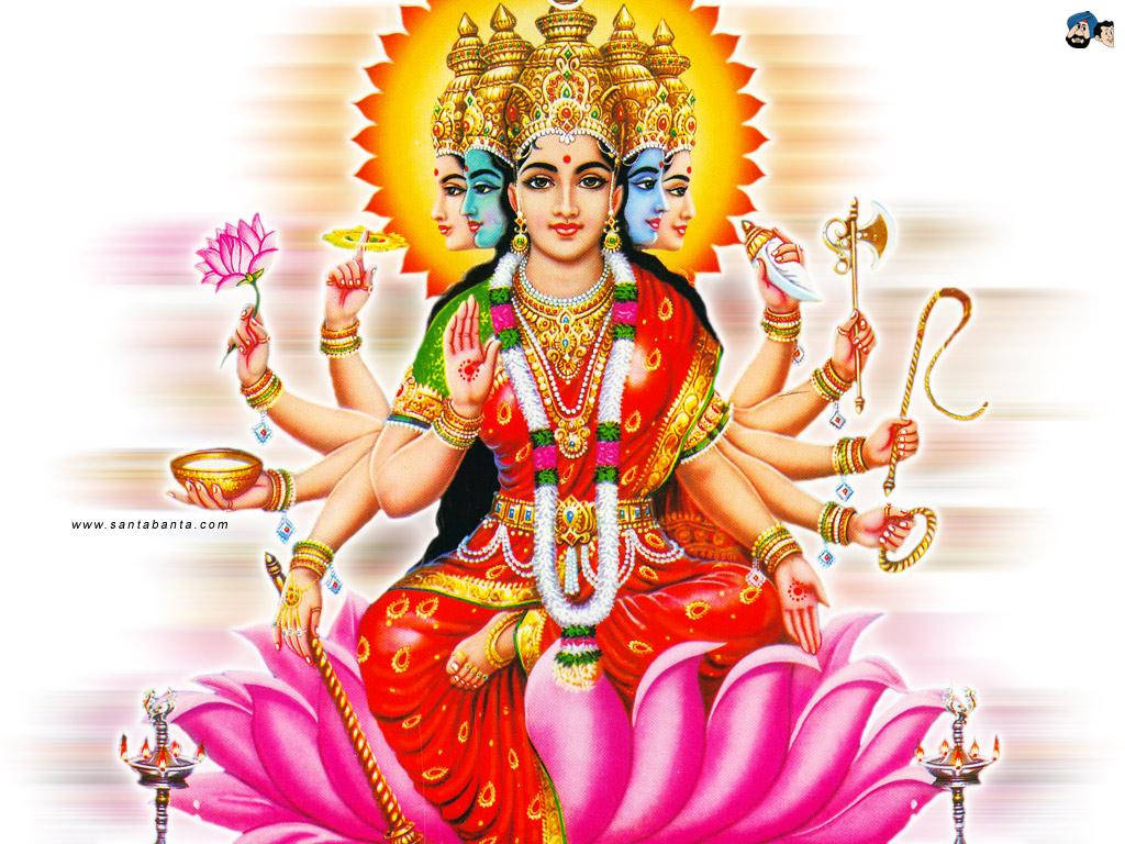 Goddelike Glans - Tienhandige Godin Lakshmi Muurpapier