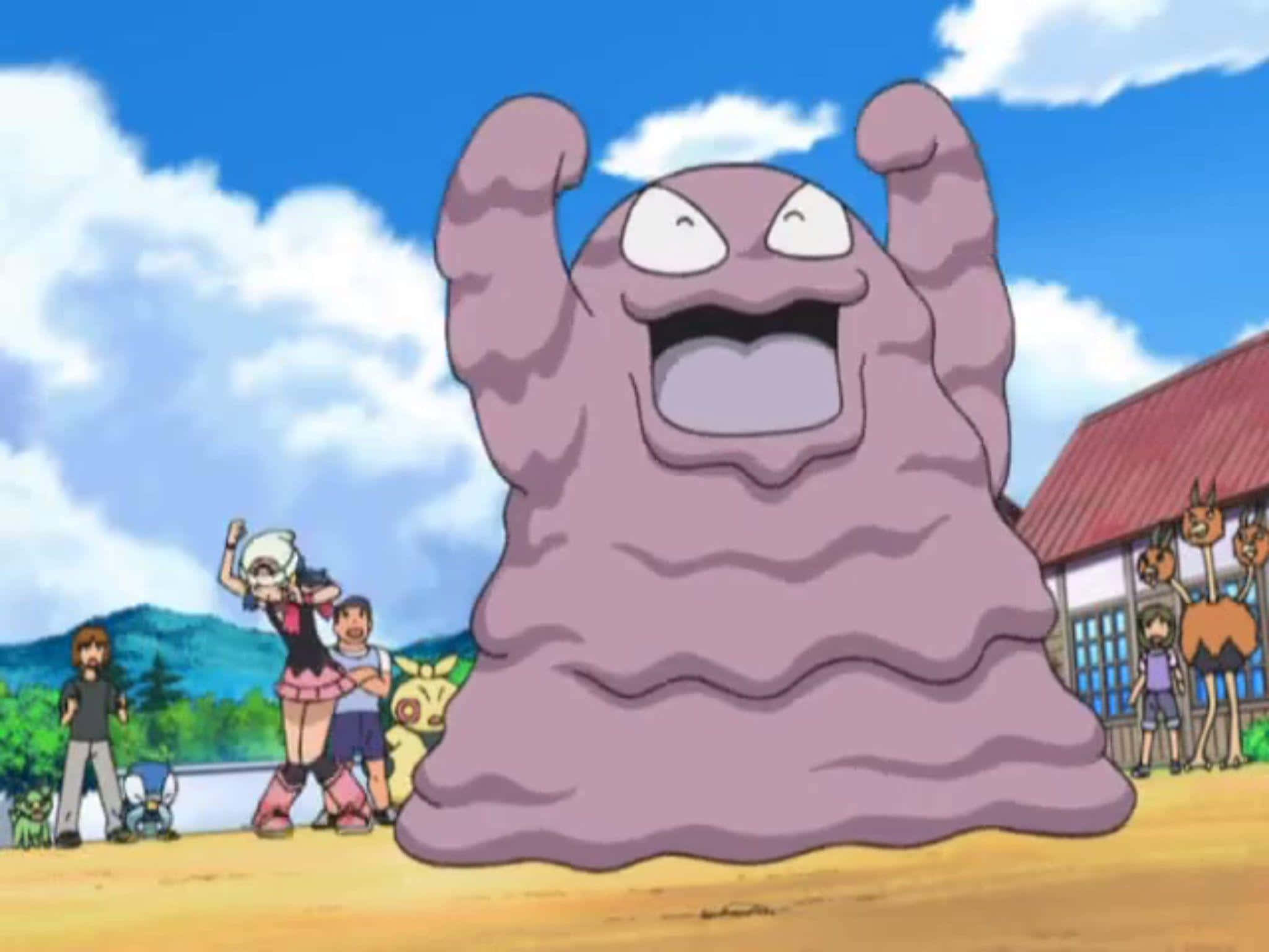Grimer wat juig in die Pokemon-reeks Muurpapier