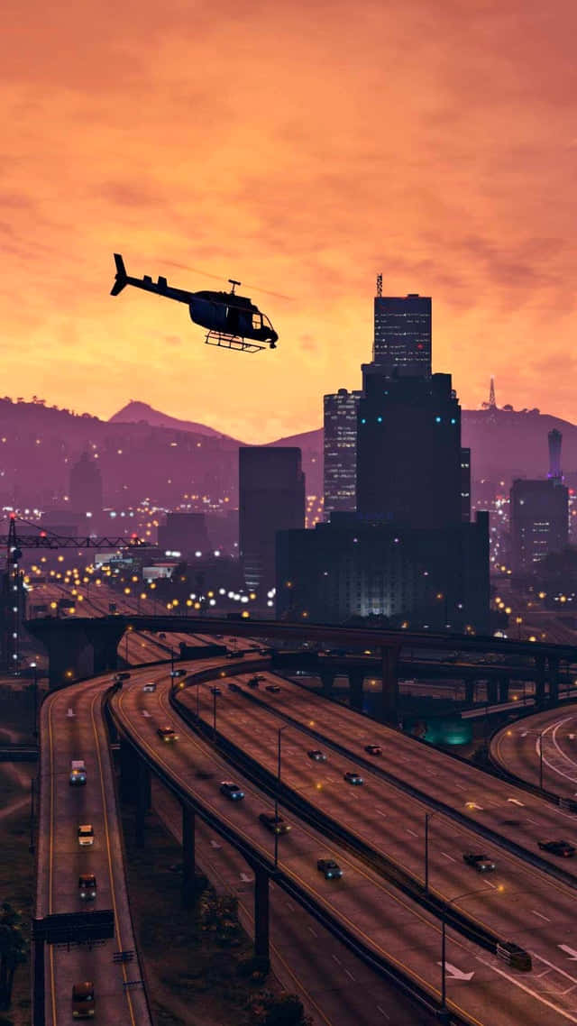 Gta-agtergrond Helikopter wat oor Los Santos vlieg Muurpapier
