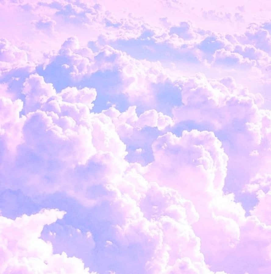 Helder Wolke Laventel Pastelpers Estetiese Agtergrond Muurpapier