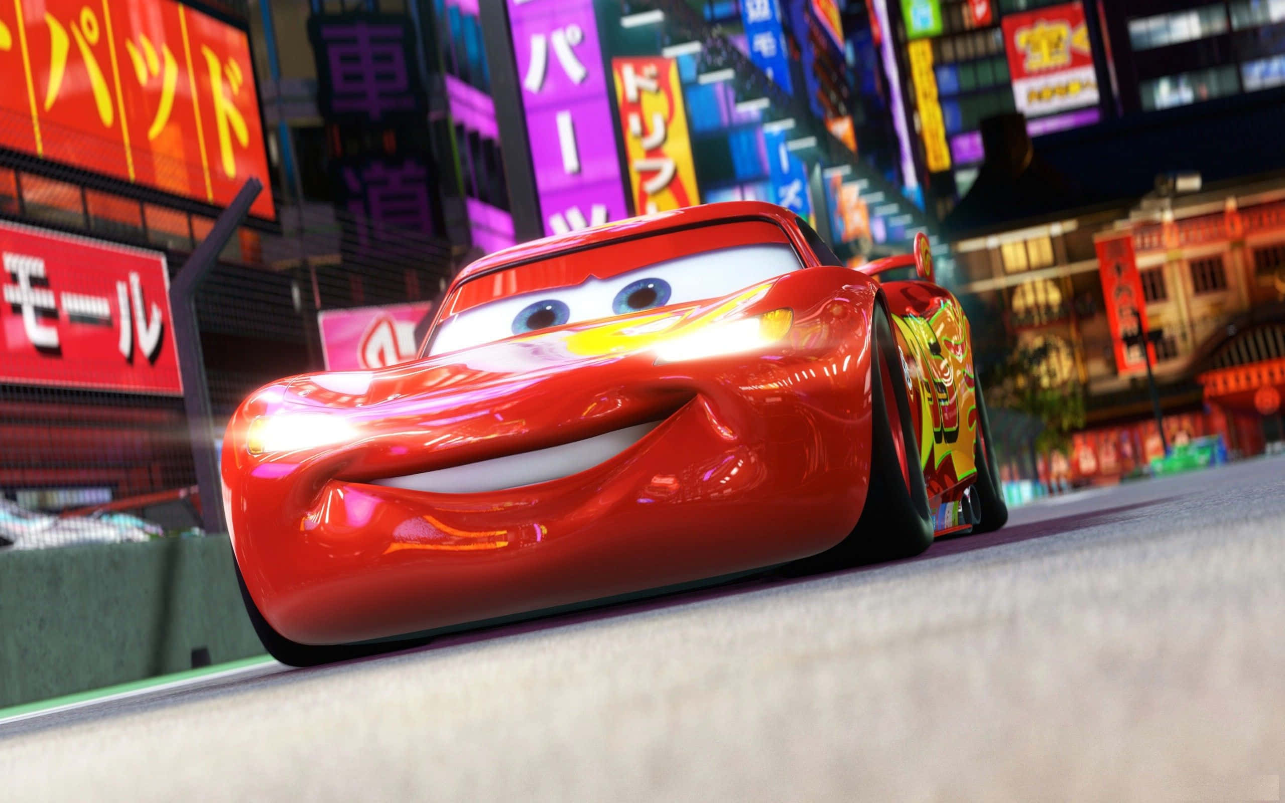 Herleef die opwindende avontuur van Cars 2 Muurpapier