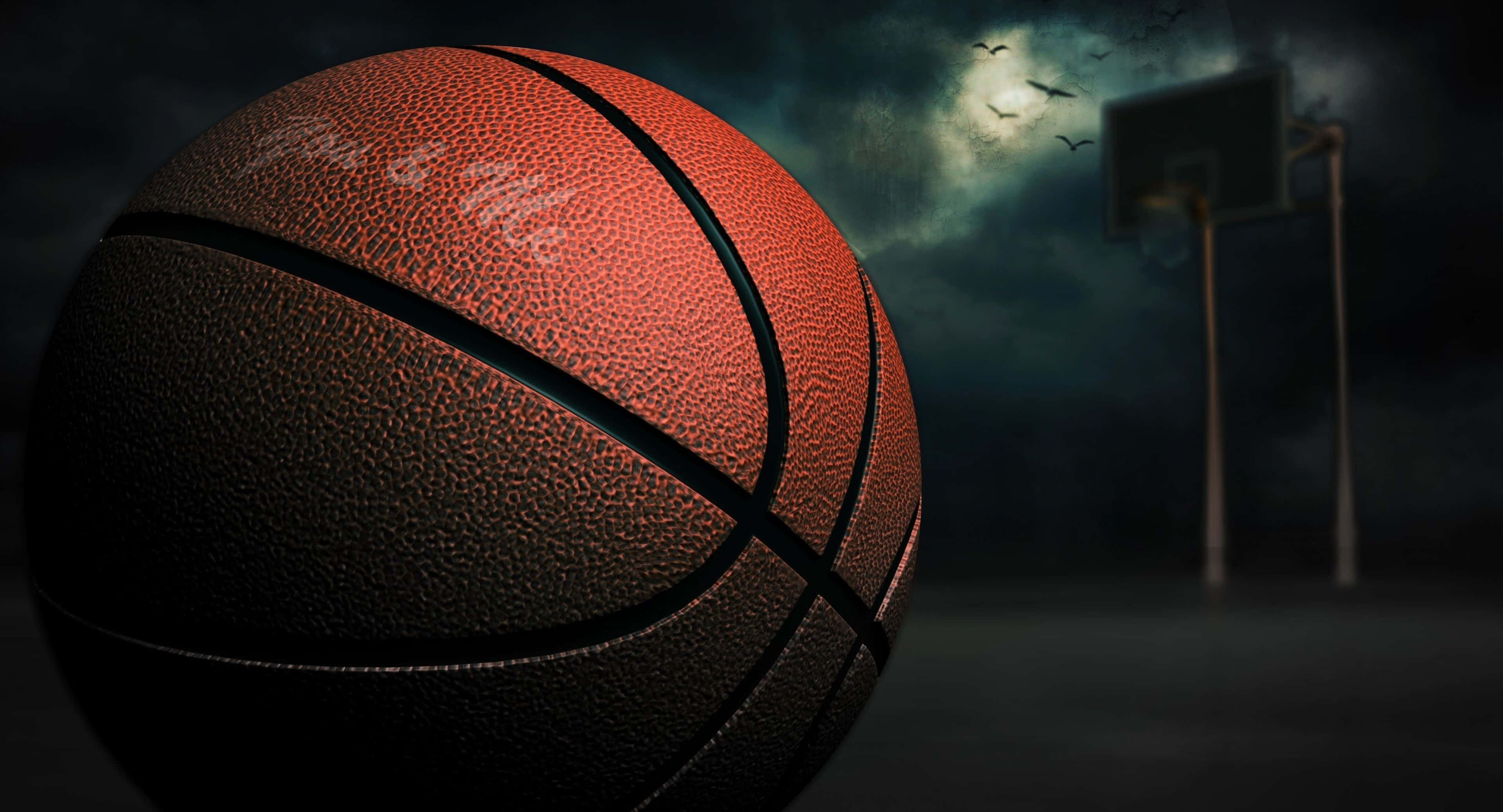 Hierdie 4K-basketbalagtergrond laat jou voel of jy deel van die wedstryd is Muurpapier