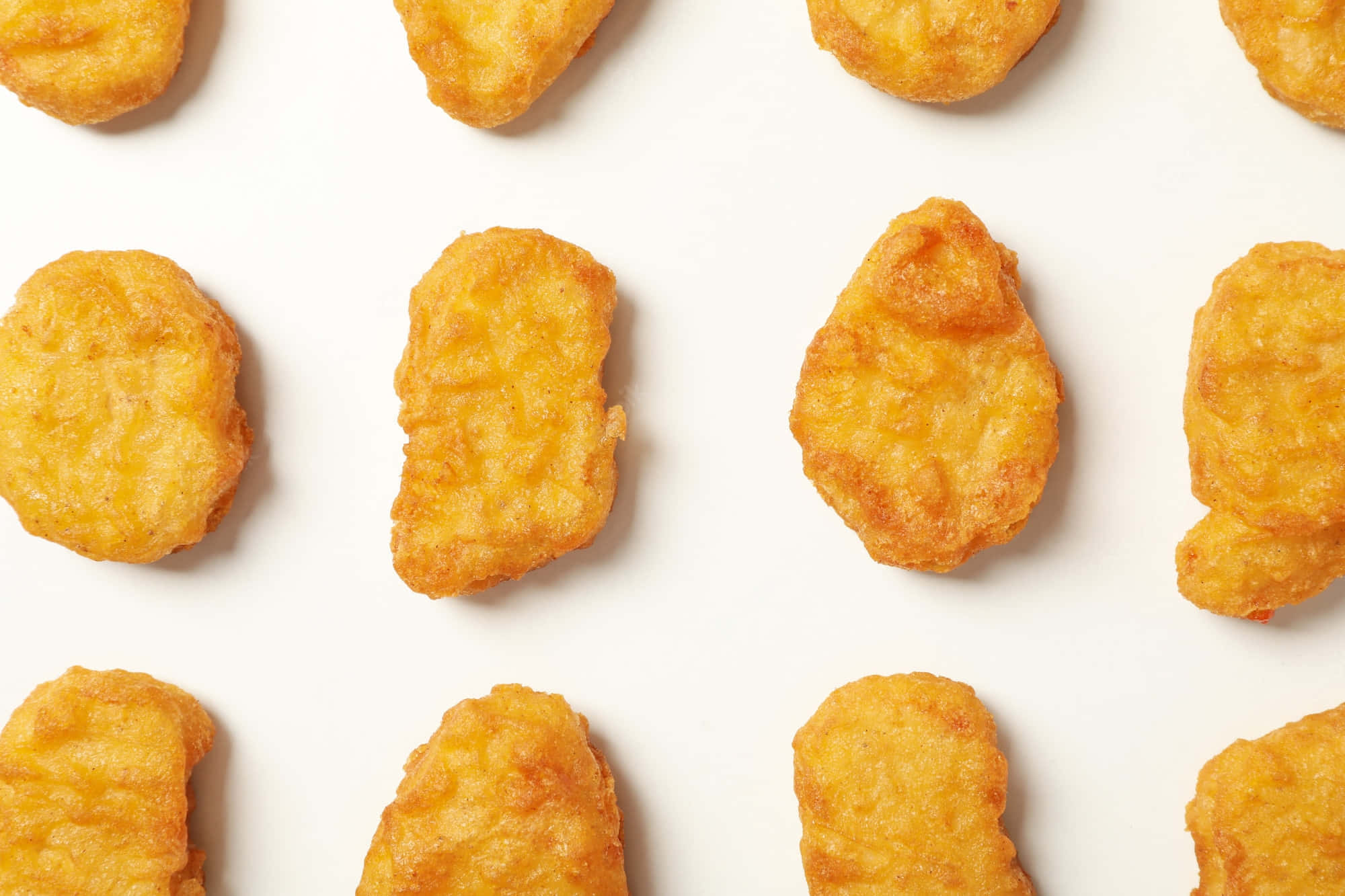 Hoendernuggets in 'n Ry Muurpapier