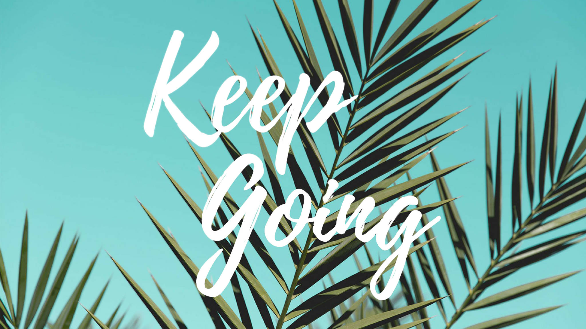 Inspirerende Estetiese Werkskermagtergrond met Aanhaling Keep Going Muurpapier